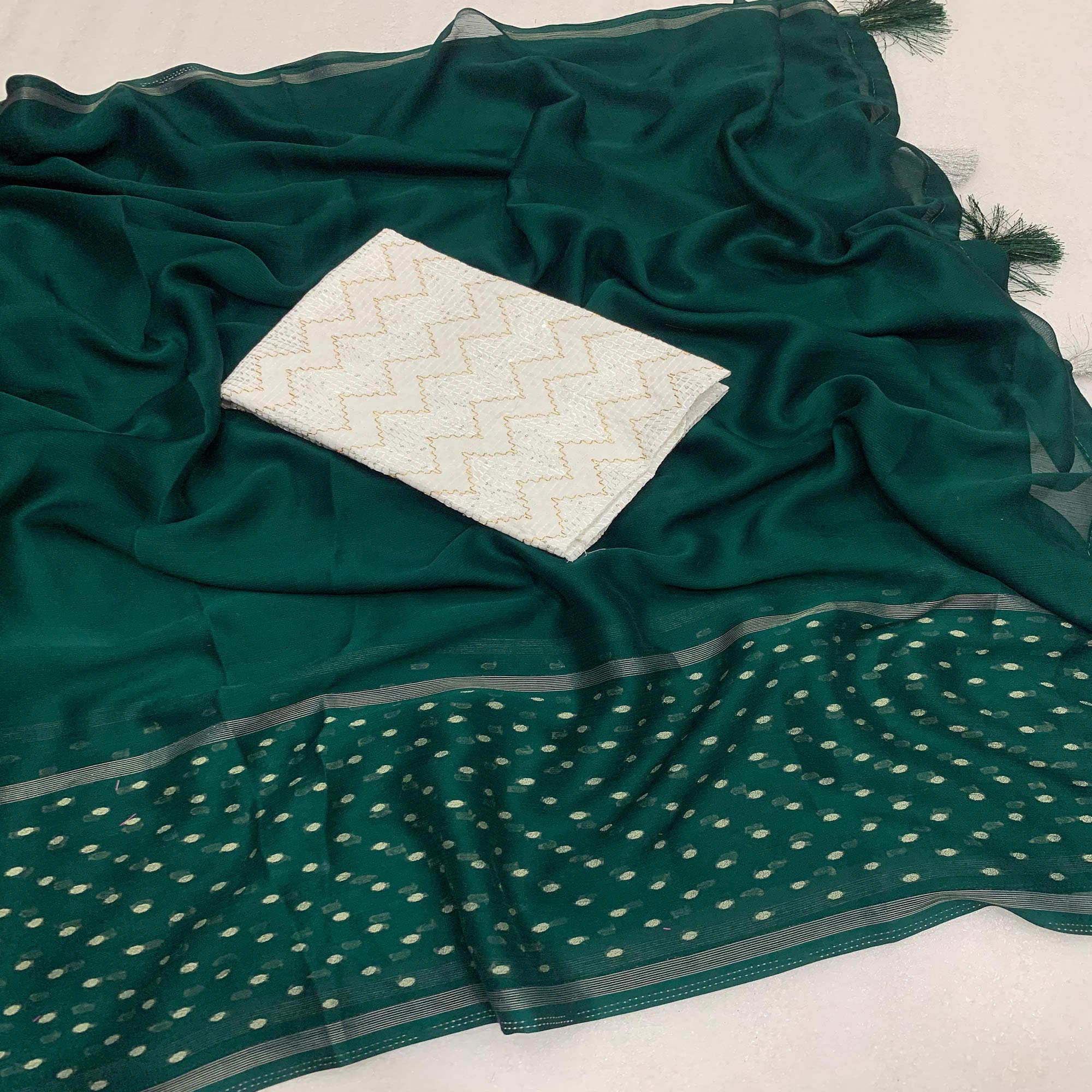 Green Woven Georgette Saree With Tassels