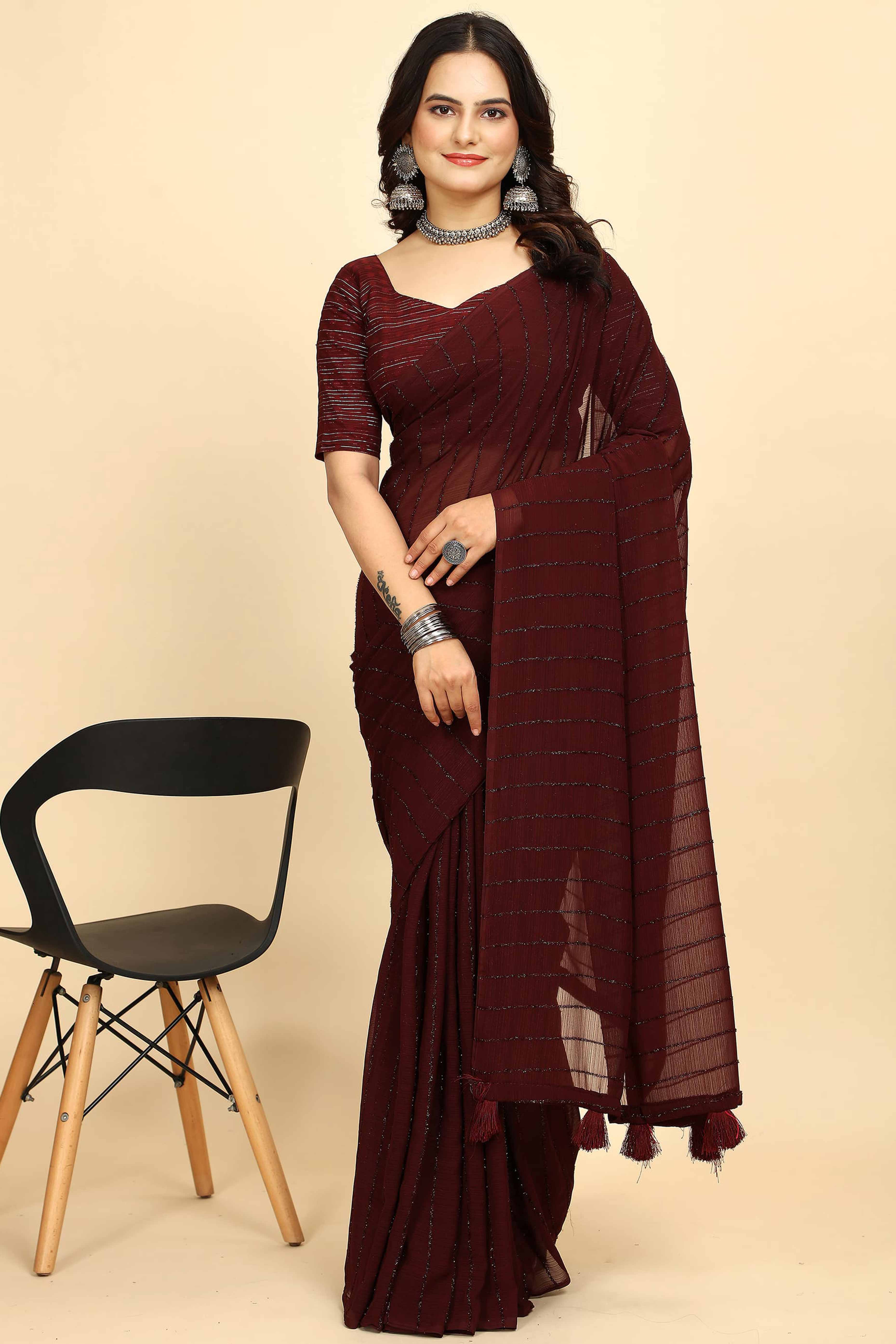 Dark Maroon Striped Zari Woven Chiffon Saree With Tassels