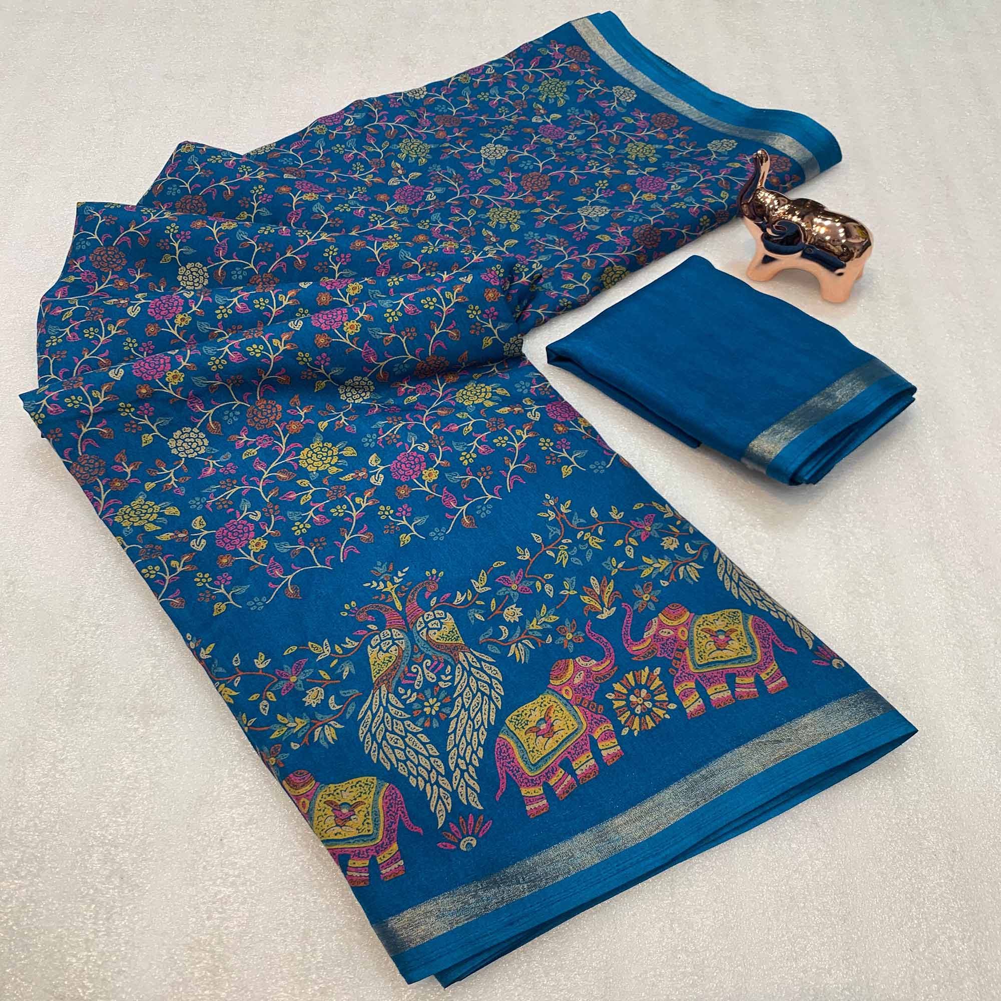 Blue Floral Printed Tussar Silk Blend Saree Accentuated With Rich Zari Border Work