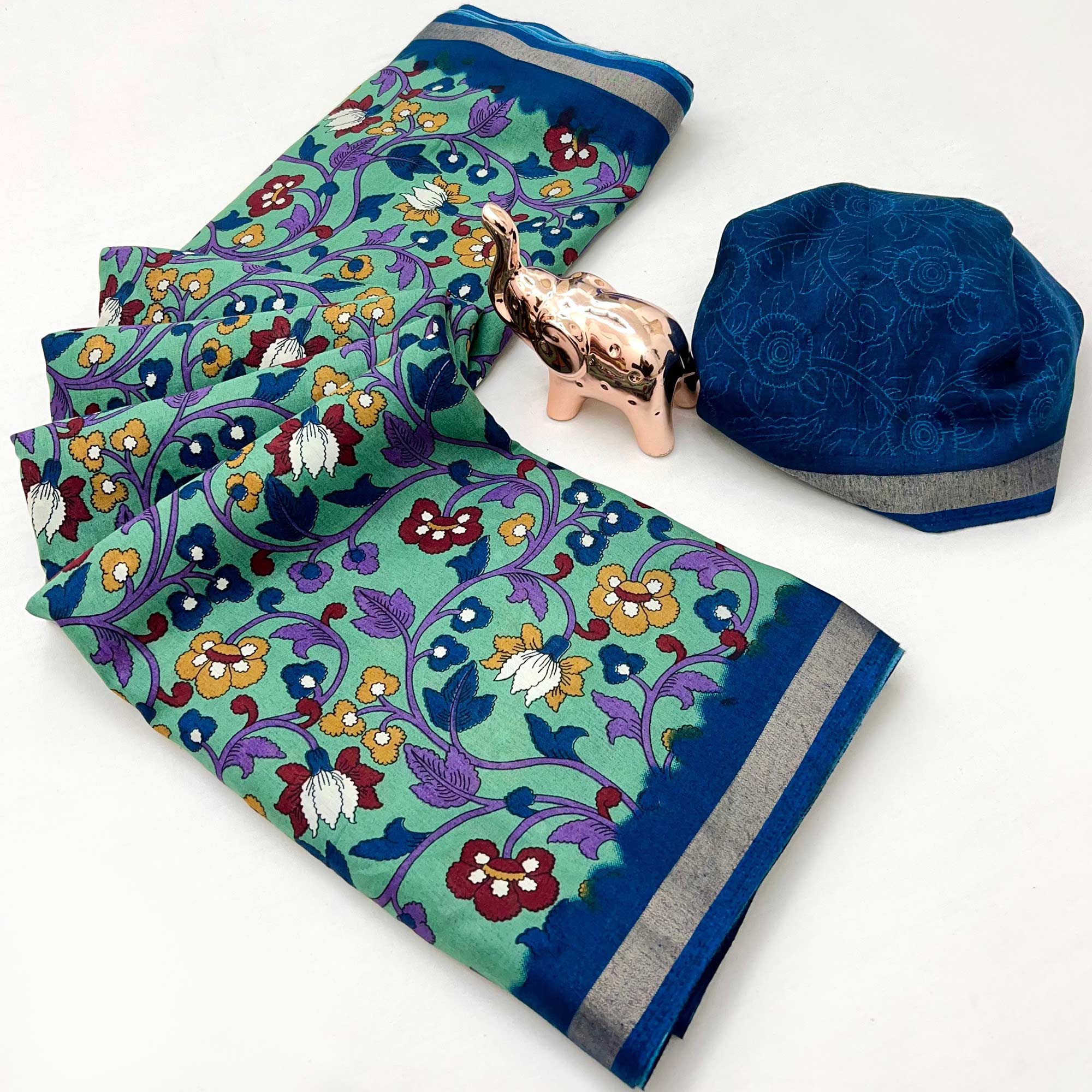 Sea Green Floral Printed Tussar Silk Blend Saree Enhanced With Intricate Zari Border Work