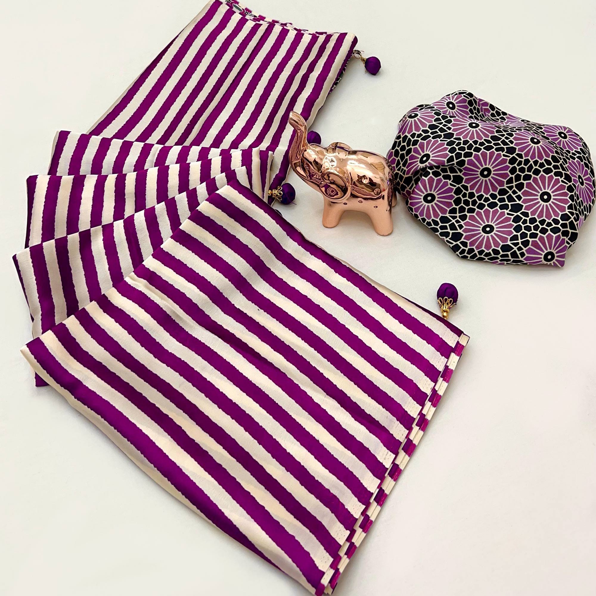 Luxe Partywear Saree in Purple Satin with Modern Striped Print and Flowing Drape