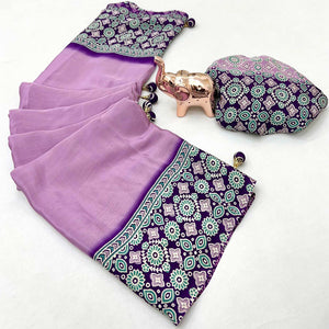 Lavender Solid Satin Saree Featuring Bold Ajrakh Print and Tassel Accented Pallu