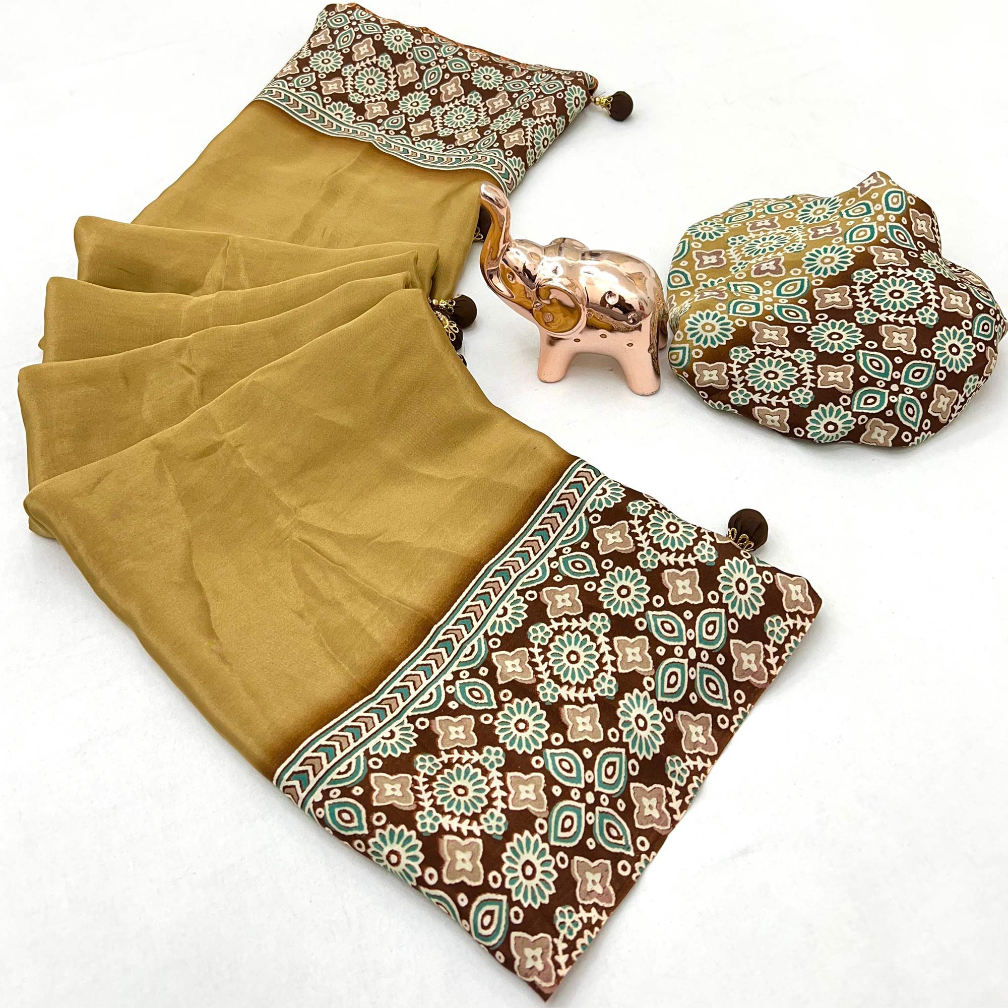 Mustard Solid Satin Saree Featuring Bold Ajrakh Print and Tassel Accented Pallu