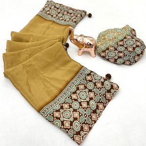 Mustard Solid Satin Saree Featuring Bold Ajrakh Print and Tassel Accented Pallu