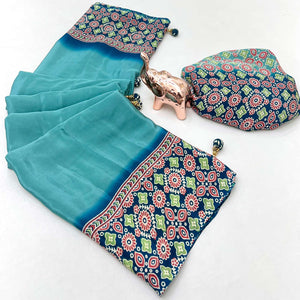 Turquoise Solid Satin Saree Featuring Bold Ajrakh Print and Tassel Accented Pallu