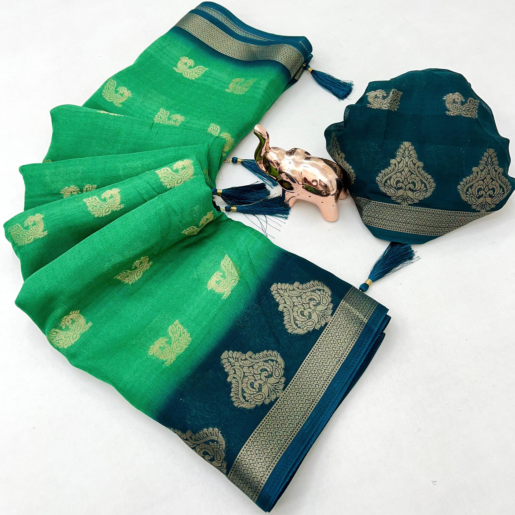 Elegant Aqua Green Peacock Pattern Zari Weaving Georgette Saree With Tassel Pallu