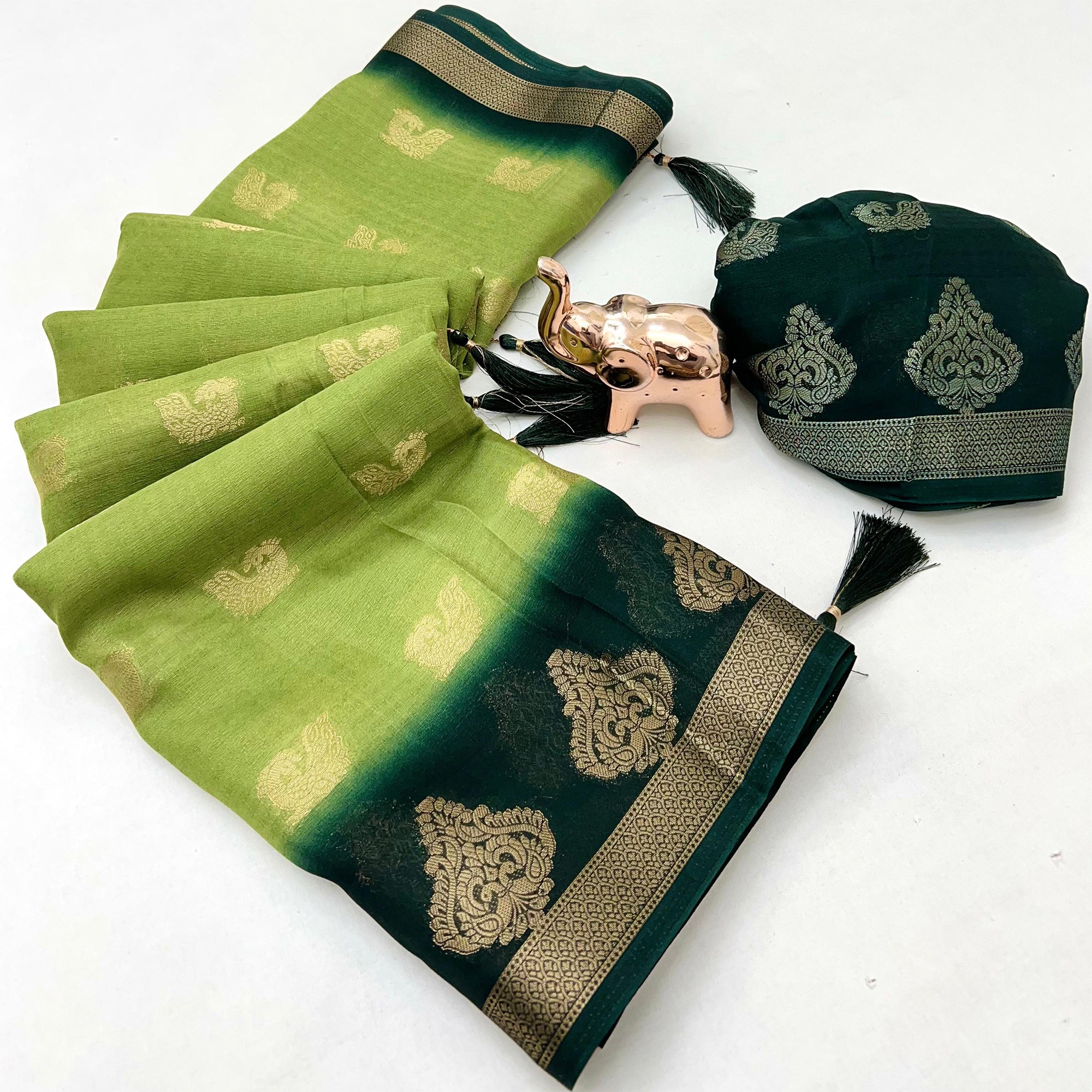 Elegant Green Peacock Pattern Zari Weaving Georgette Saree With Tassel Pallu