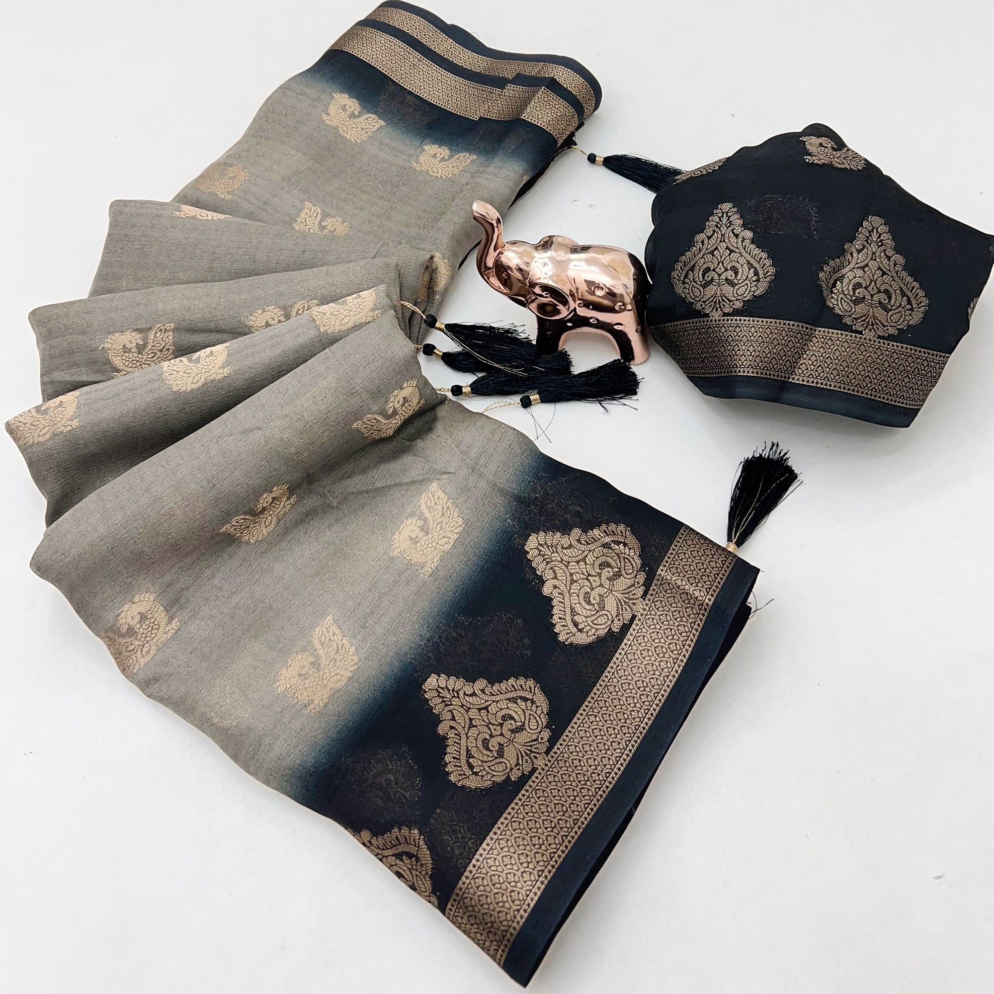 Elegant Grey Peacock Pattern Zari Weaving Georgette Saree With Tassel Pallu