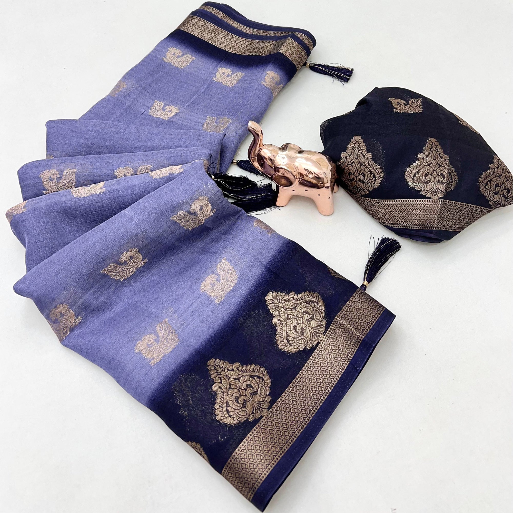 Elegant Lavender Peacock Pattern Zari Weaving Georgette Saree With Tassel Pallu