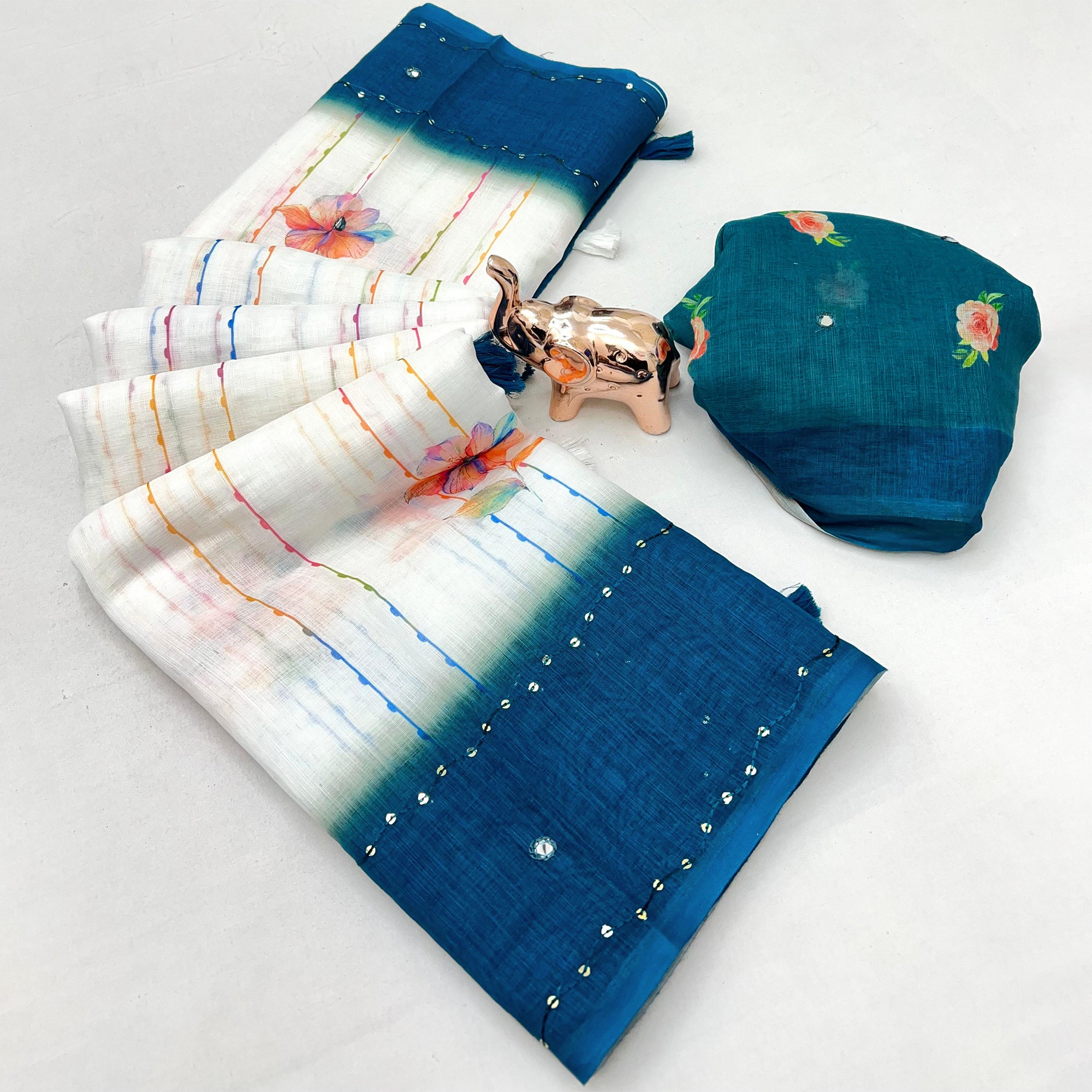 White and Teal Digital Printed Linen Cotton Saree with Refined Artistic Detailing