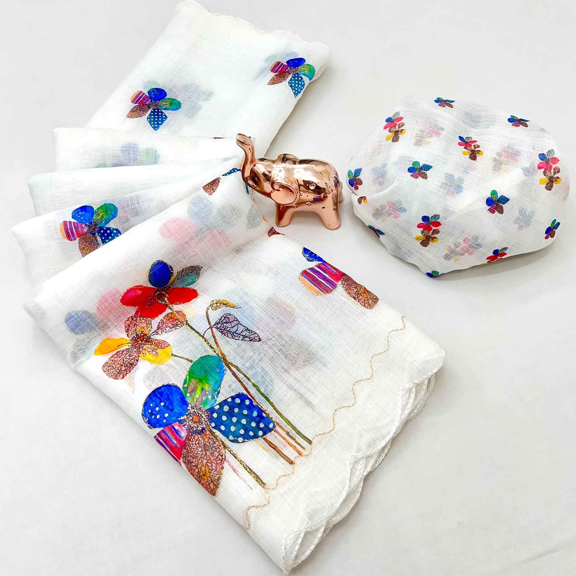 White Linen Saree Featuring Floral Digital Print With Zari Outline & Cutwork Border