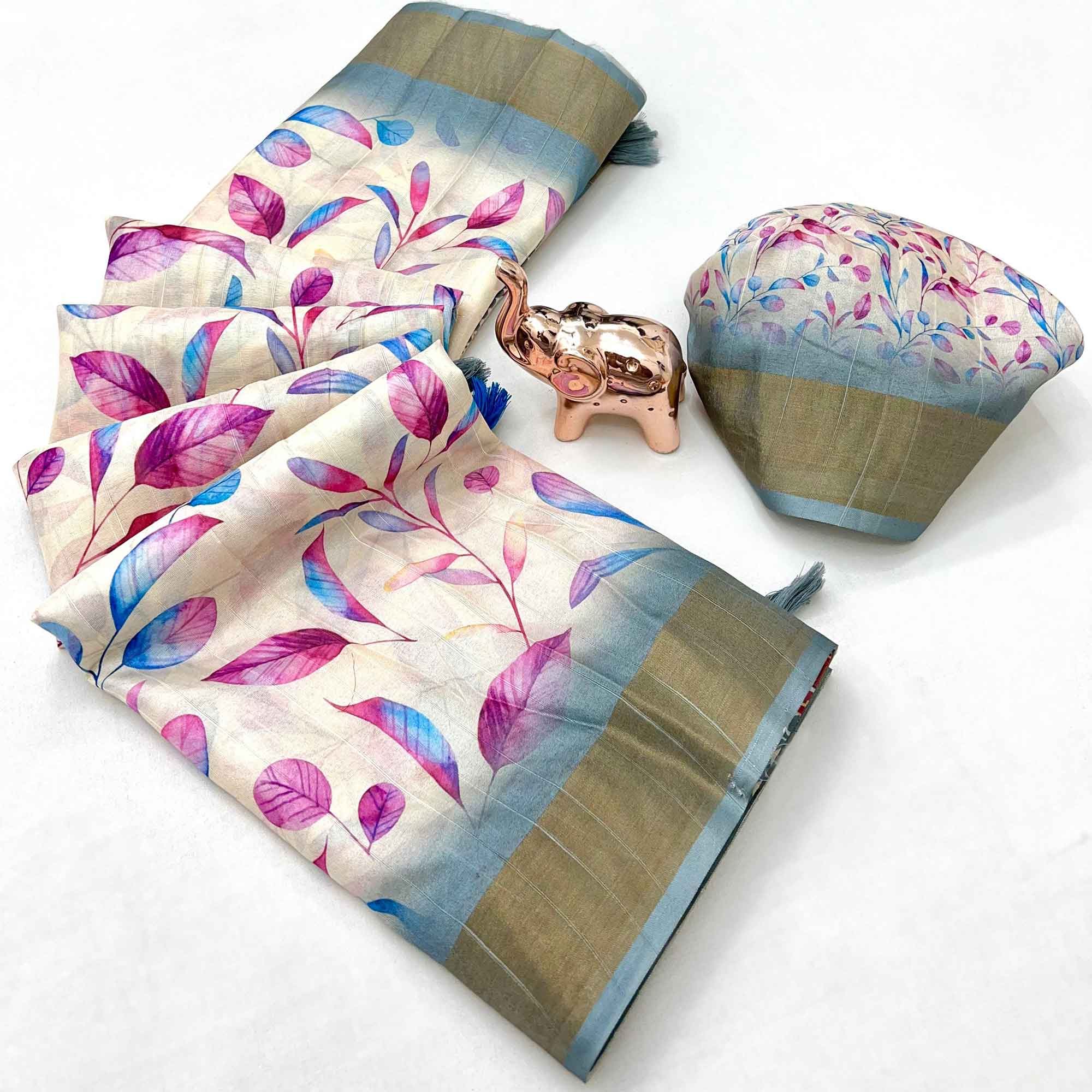 Festive Off White Silk Blend Saree with Subtle Floral Print and Shimmering Zari Border