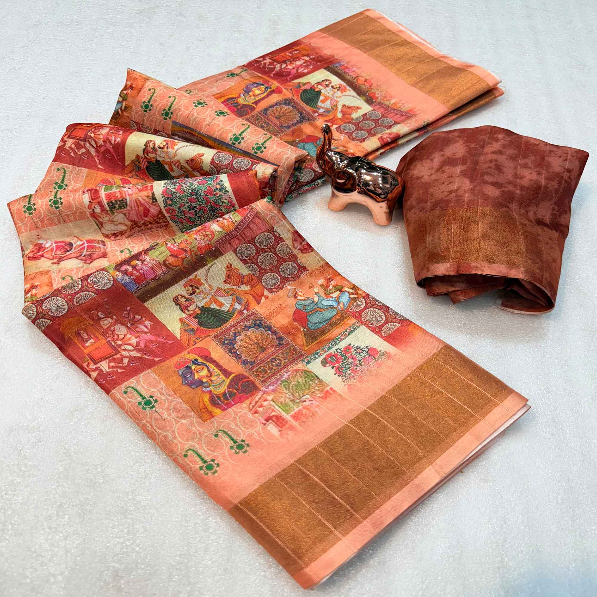 Festive Peach Silk Blend Saree with Subtle Floral Print and Shimmering Zari Border