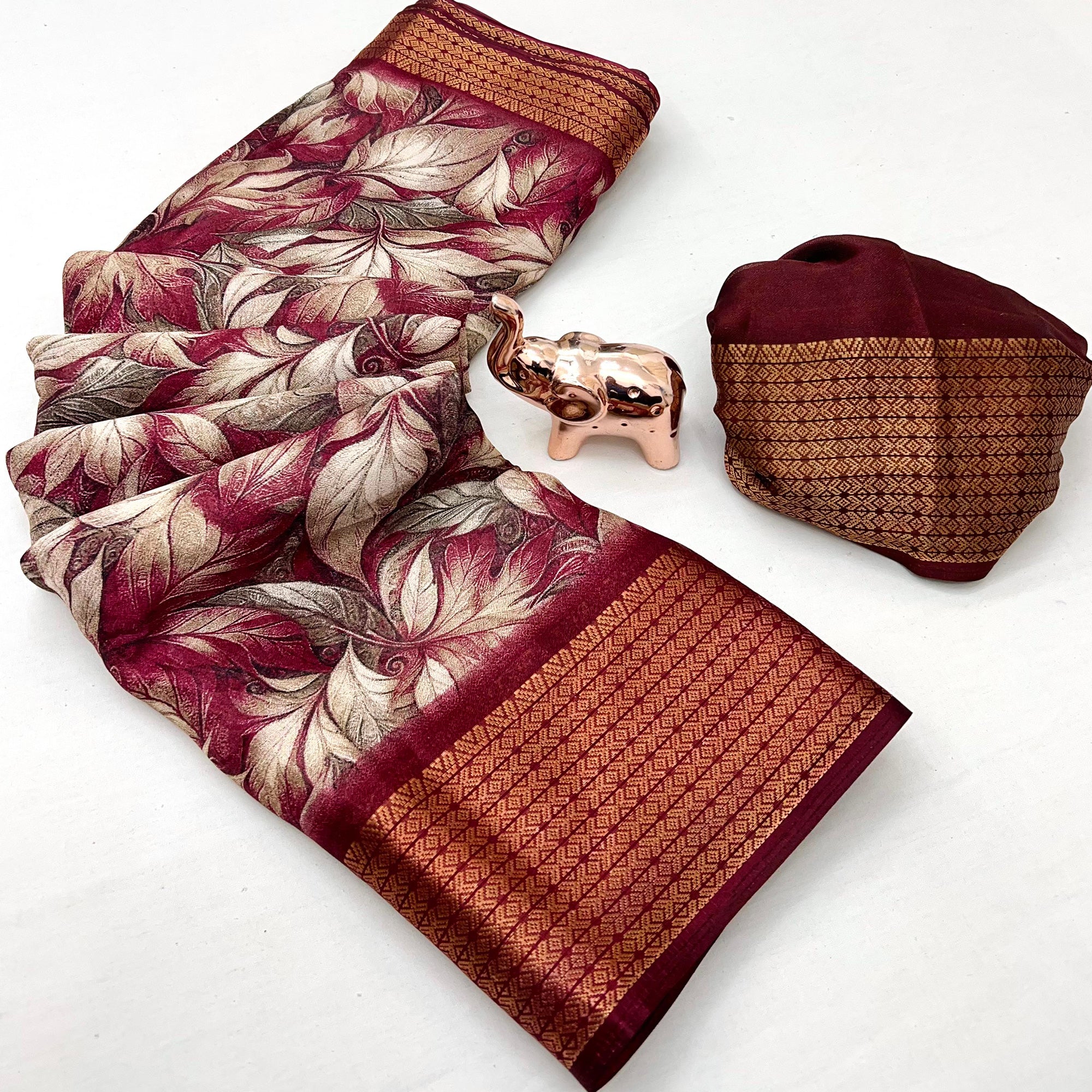 Maroon Leaf Printed Dola Silk Marshmallow Saree With Paisley Jaal Pallu & Lustrous Weaving Border