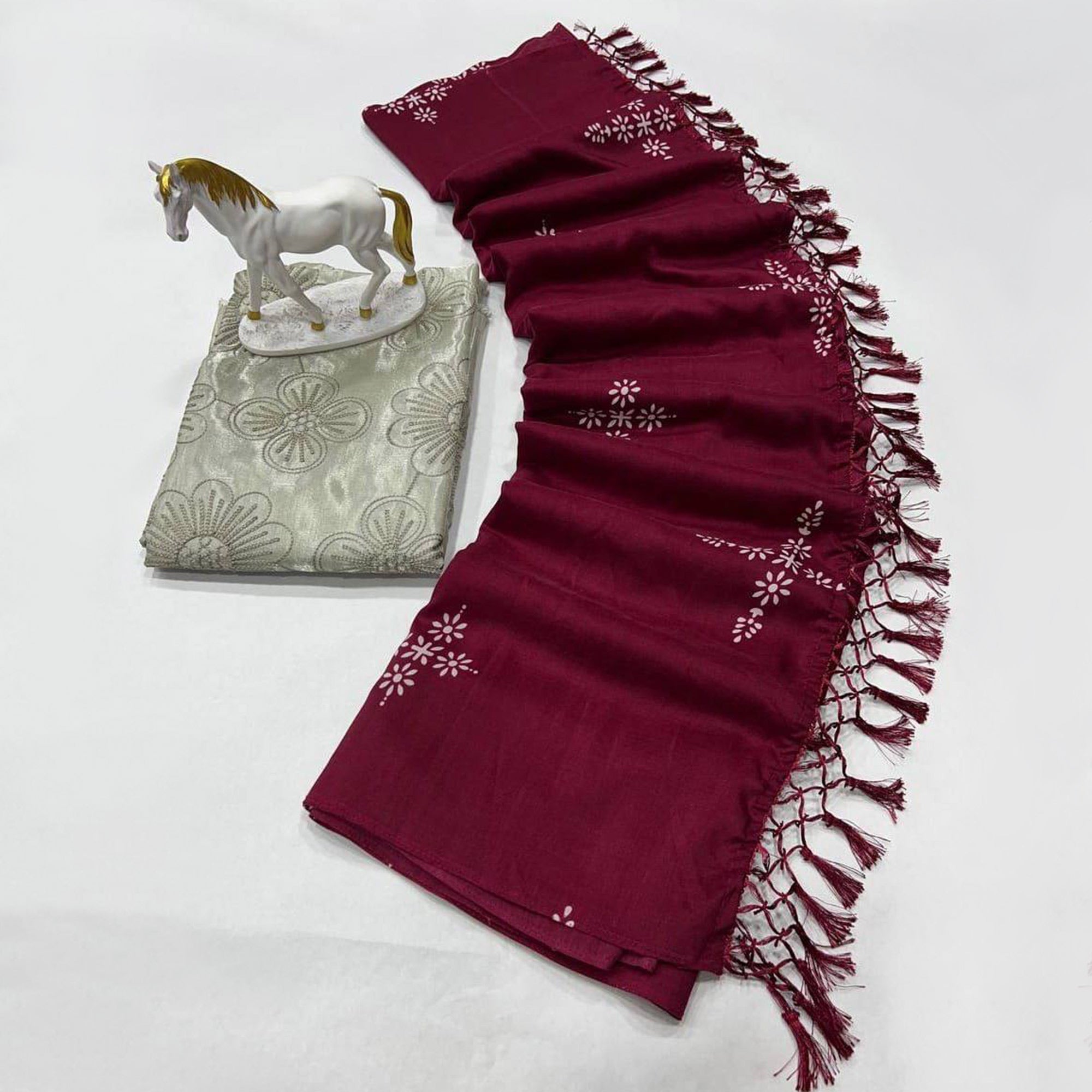 Wine Floral Printed Muslin Saree With Tassels