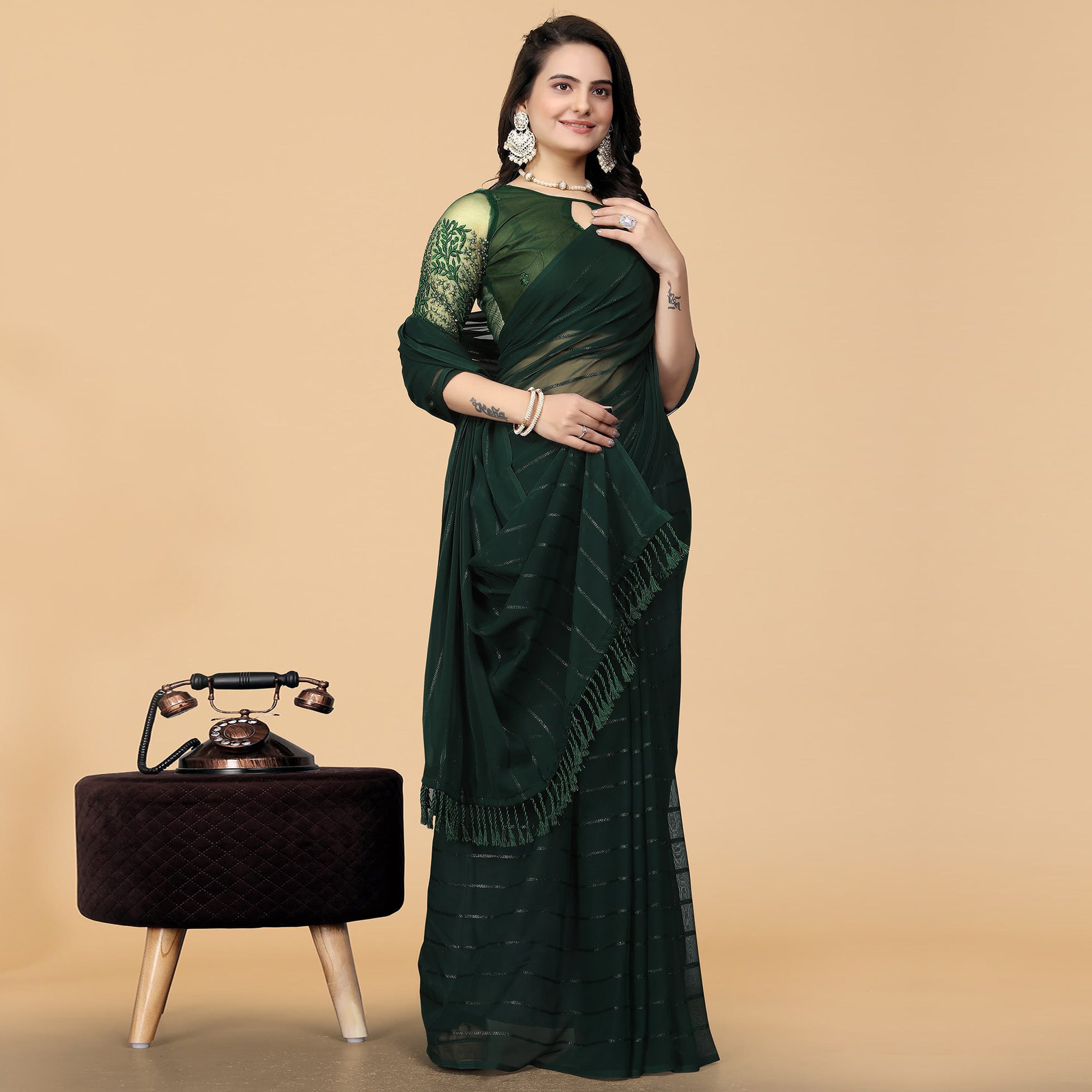 Green Woven Georgette Saree with Tassels