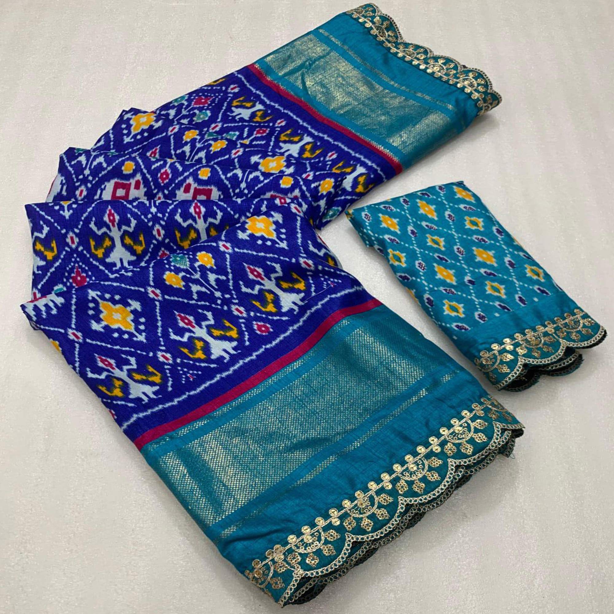 Blue Ikkat Printed Dola Silk Saree With Sequins Embroidered Border