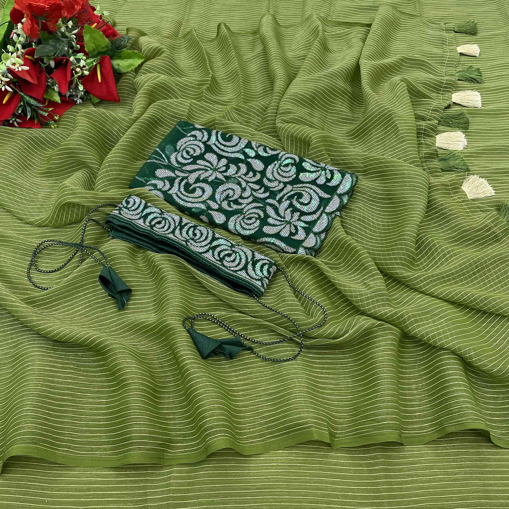 Green Woven Chiffon Saree with Tassels