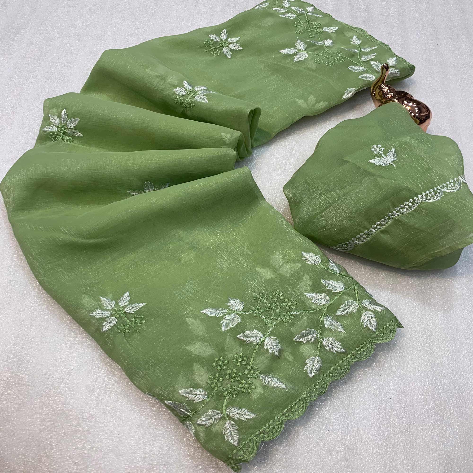 Green Chiffon Saree Adorned With Delicate Floral Thread Embroidery