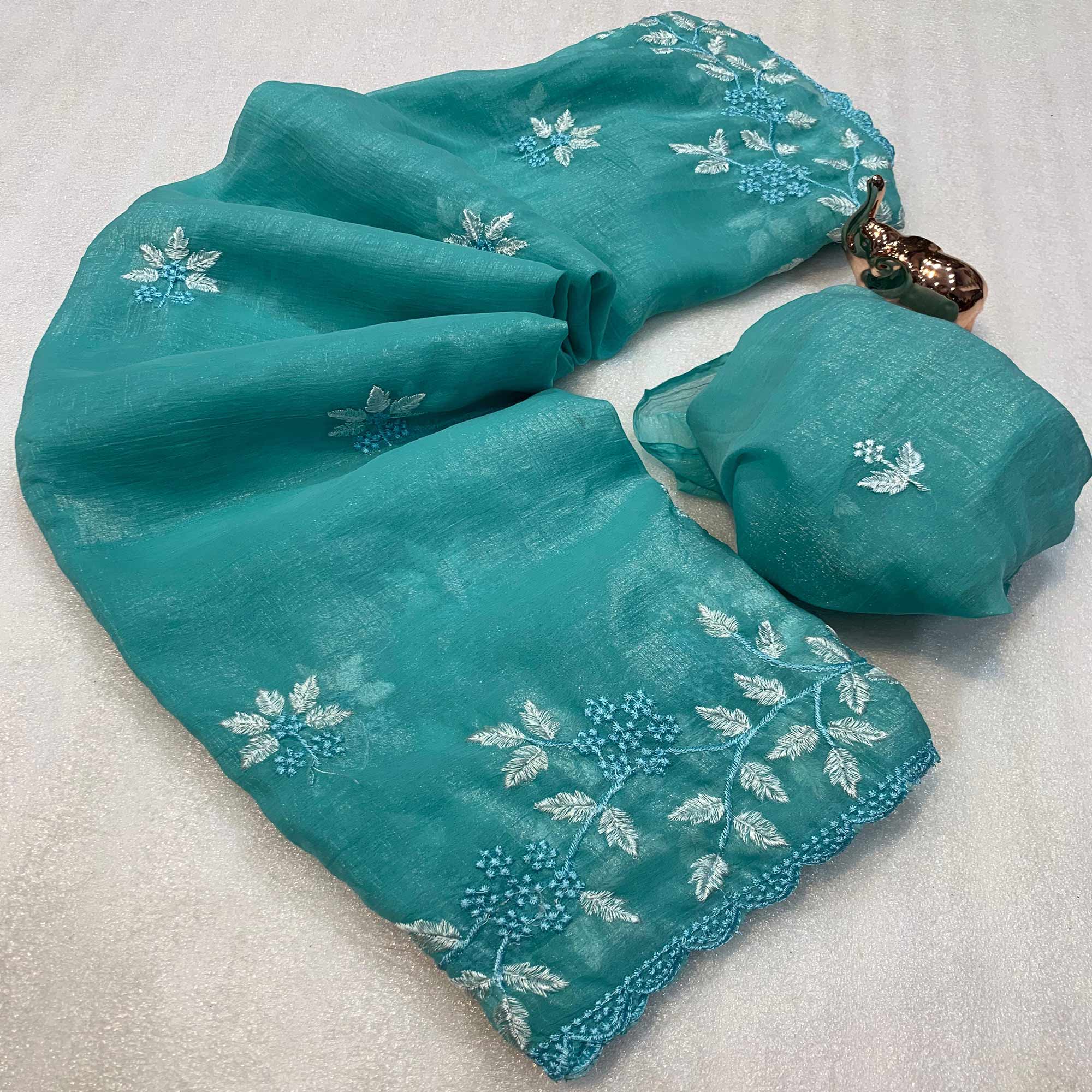 Turquoise  Chiffon Saree Adorned With Delicate Floral Thread Embroidery