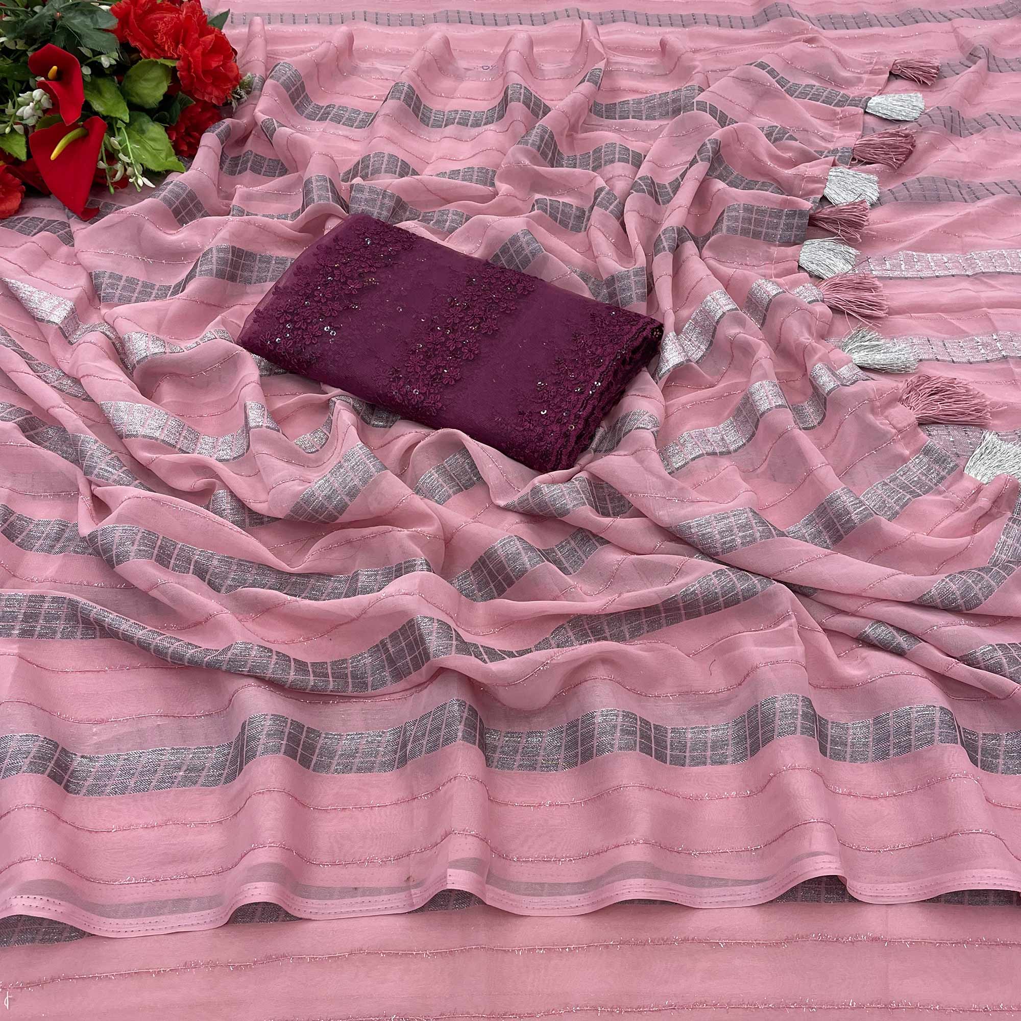 Pink Zari Striped Georgette Saree With Tassels