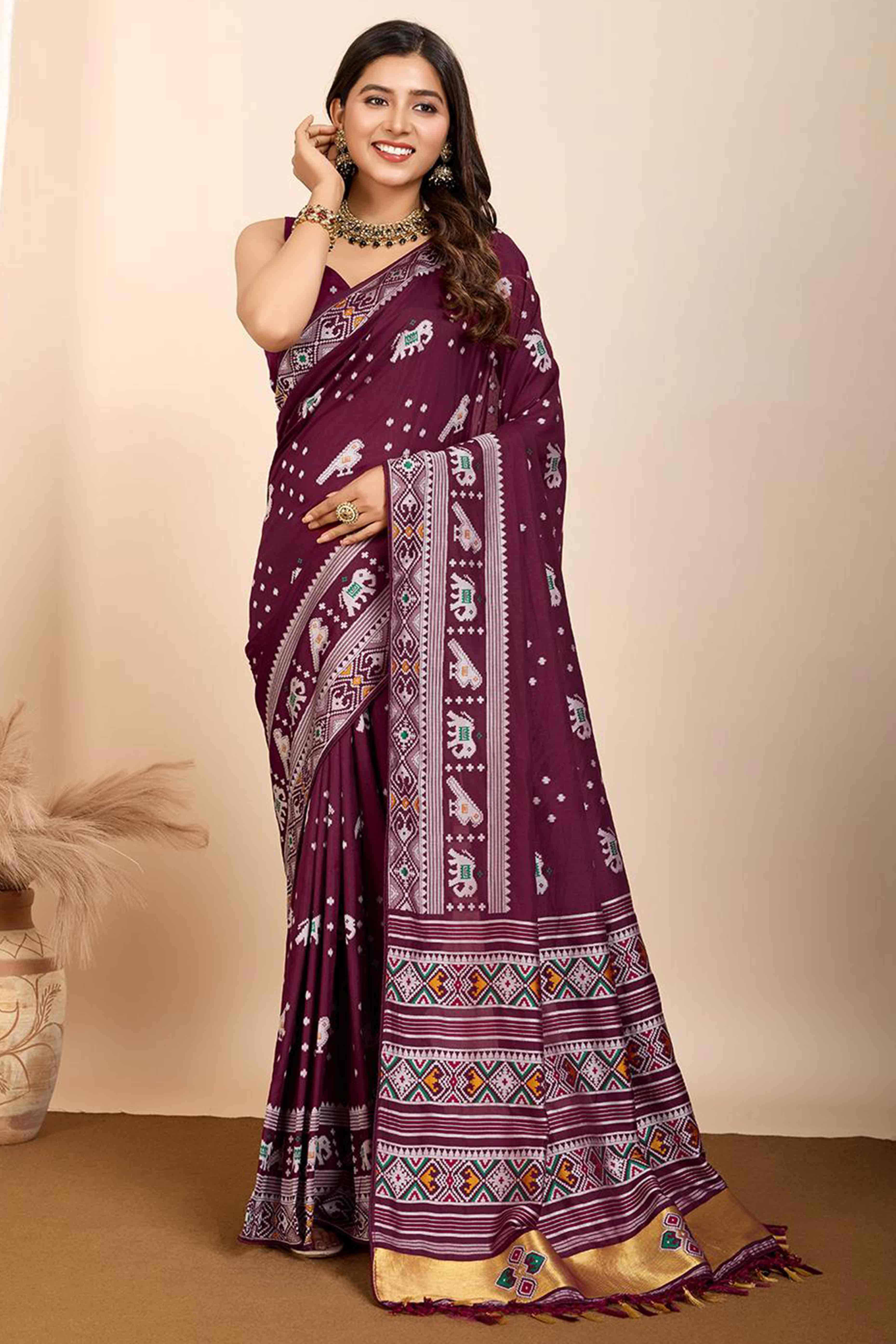Wine Woven Dola Silk Patola Saree With Tassels