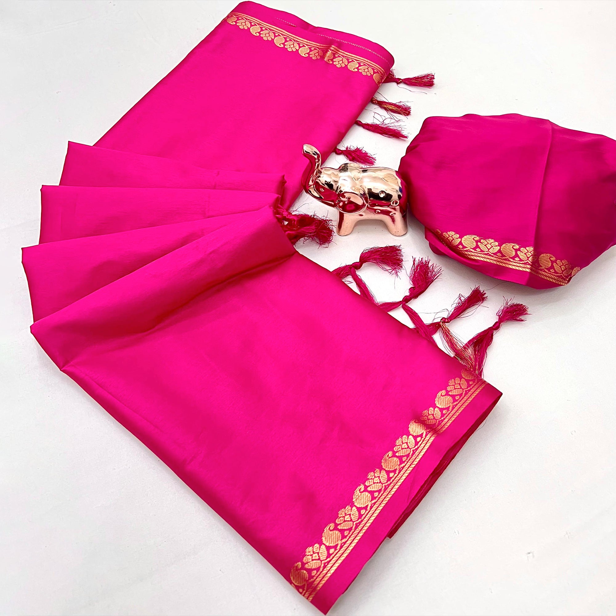 Classic Rani Pink Solid Weaving Mysore Silk Saree Accented With Floral Border & Tassel Pallu