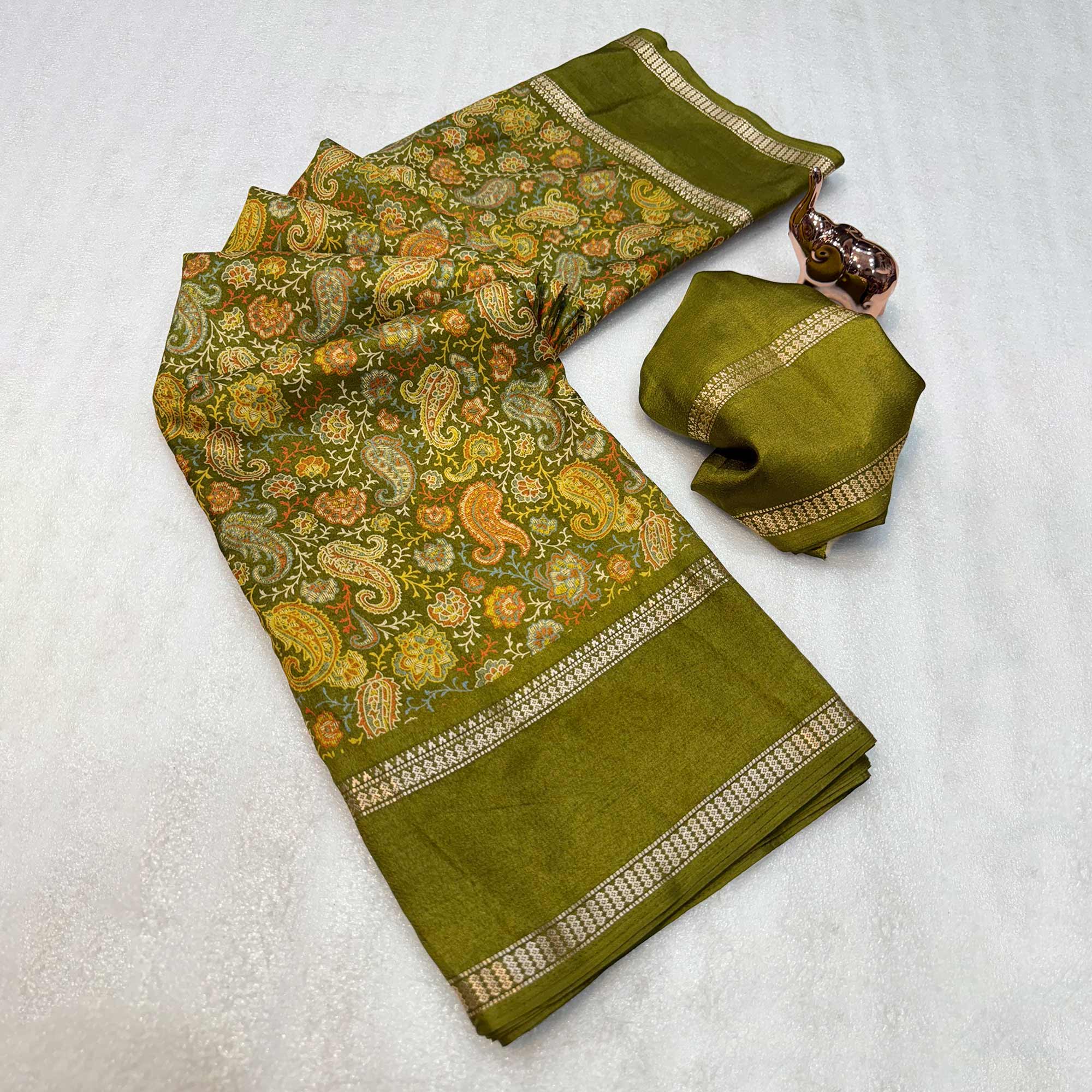 Gorgeous Green Soft Silk Blend Saree Featuring Classic Paisley Prints for Elegant Occasions