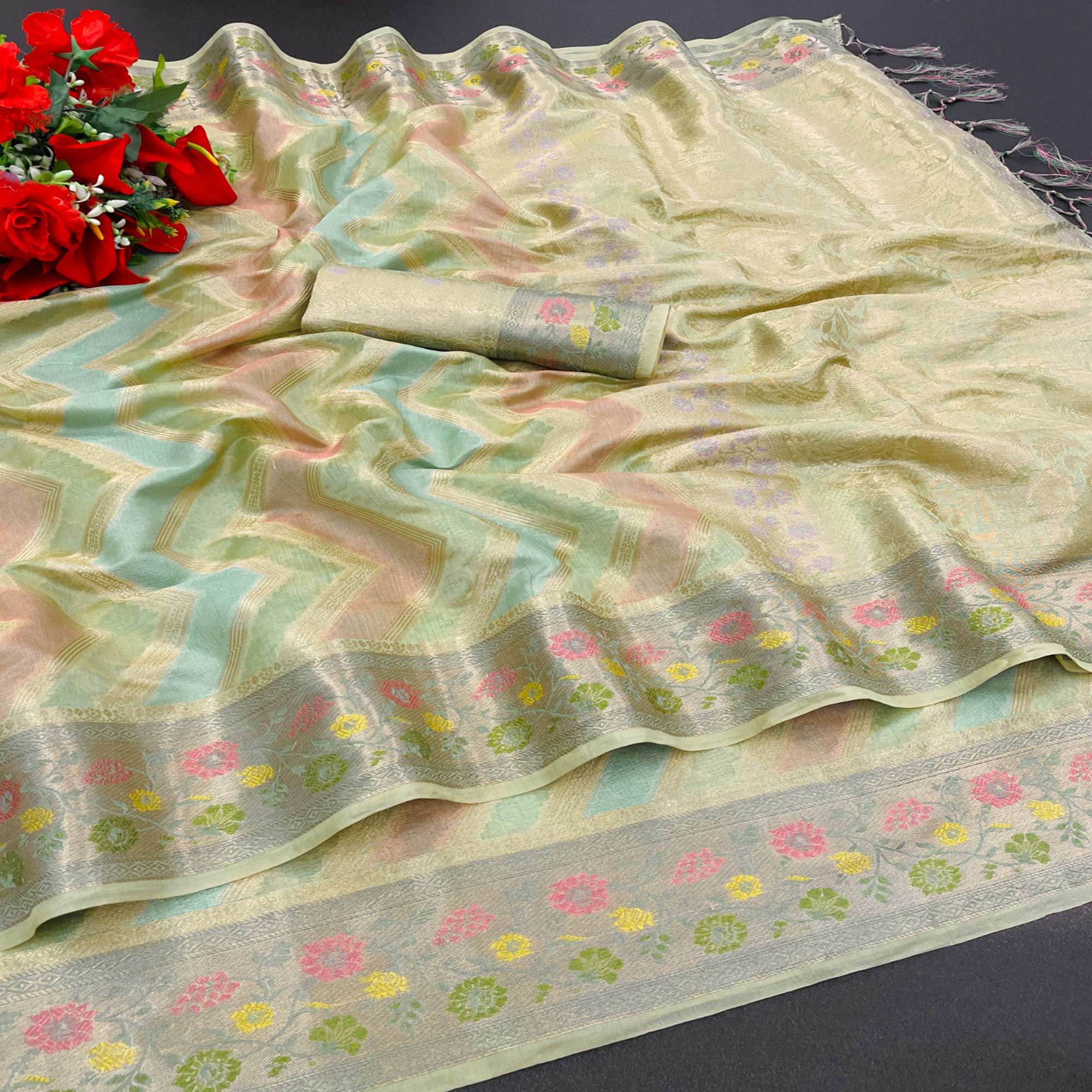 Green Woven Organza Saree With Tassels