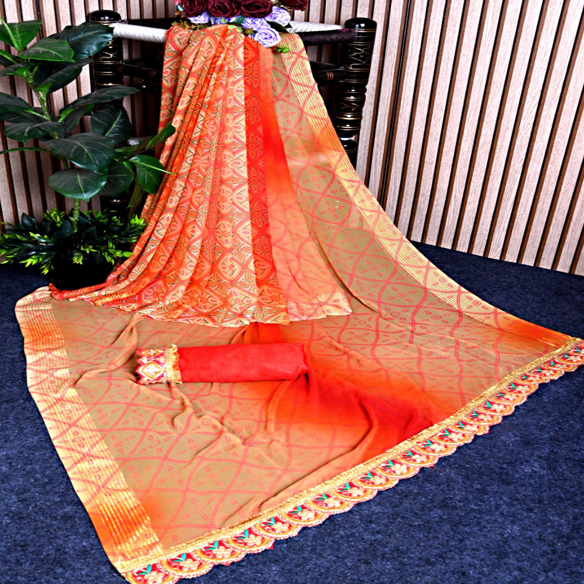 Chikoo & Orange Bandhani Printed Georgette Saree With Zari Border