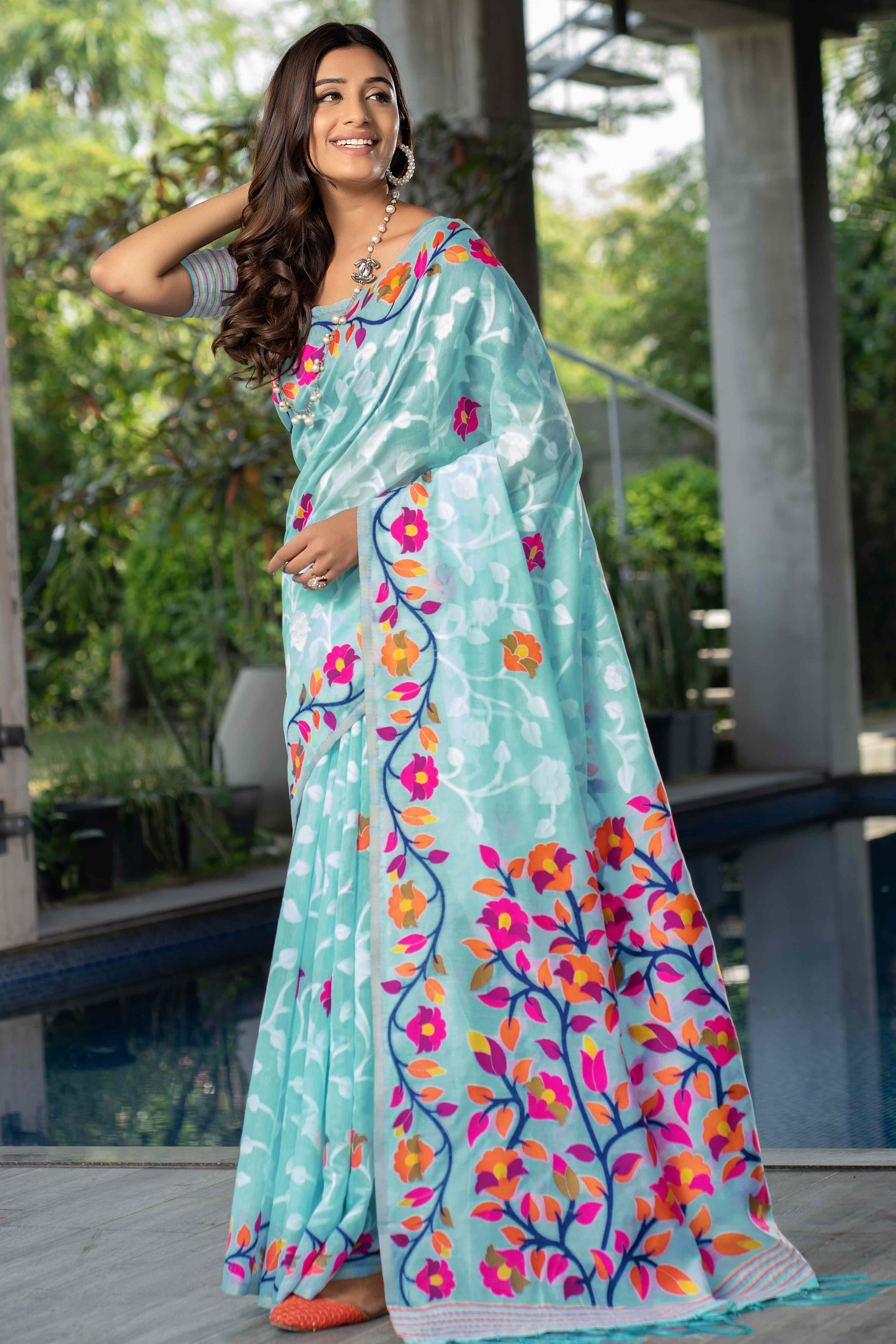 Blue Floral Woven Cotton Jacquard Jamdani Saree With A Graceful Tassel Border