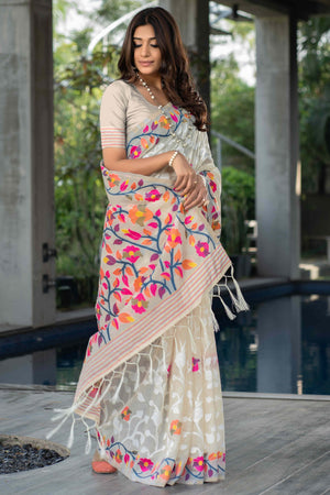 Cream Floral Woven Cotton Jacquard Jamdani Saree With A Graceful Tassel Border