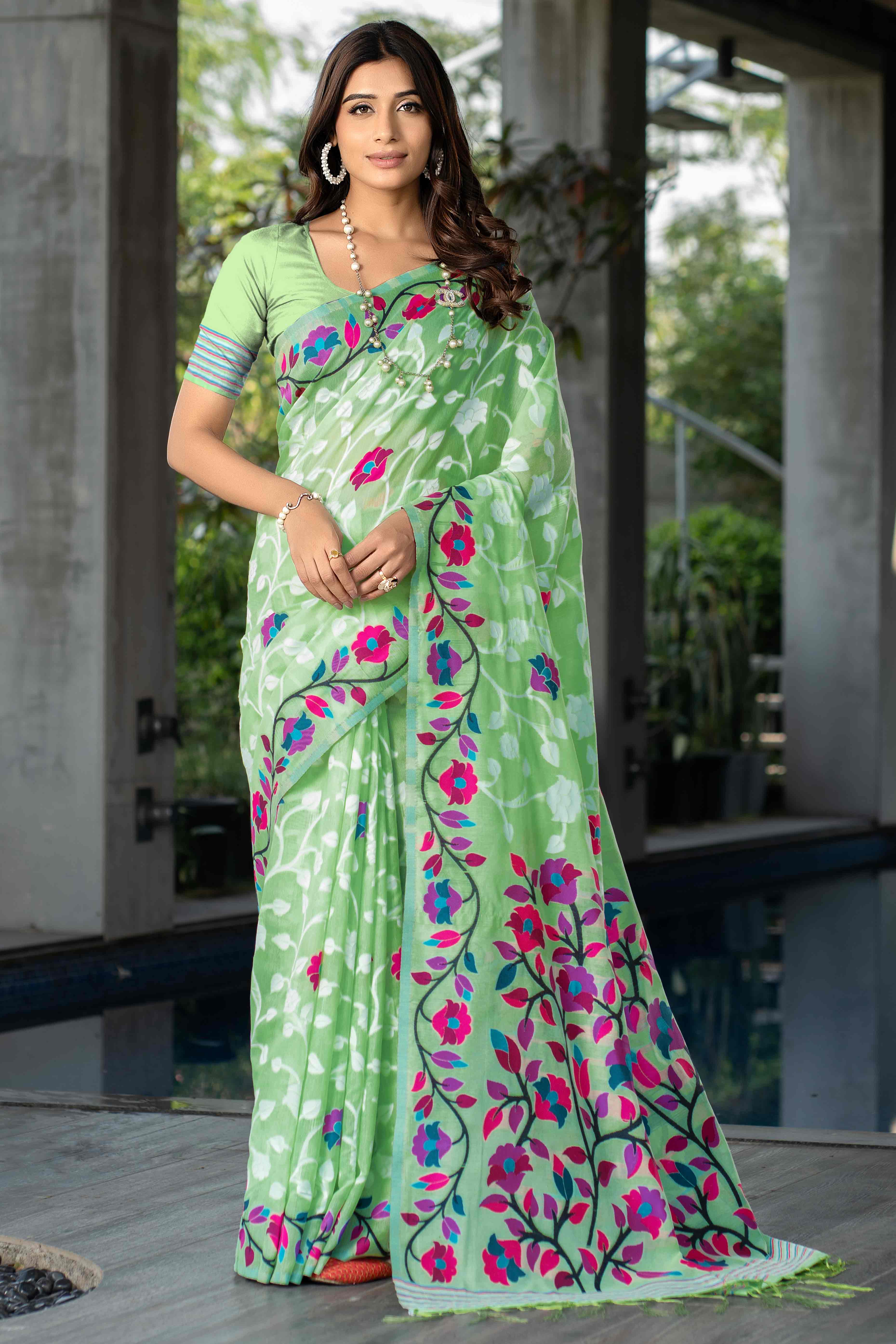 Green Floral Woven Cotton Jacquard Jamdani Saree With A Graceful Tassel Border