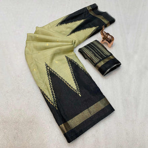 Subtle & Stylish Chikoo Saree With Ikkat Prints In Luxe Dola Silk For Festive Wear