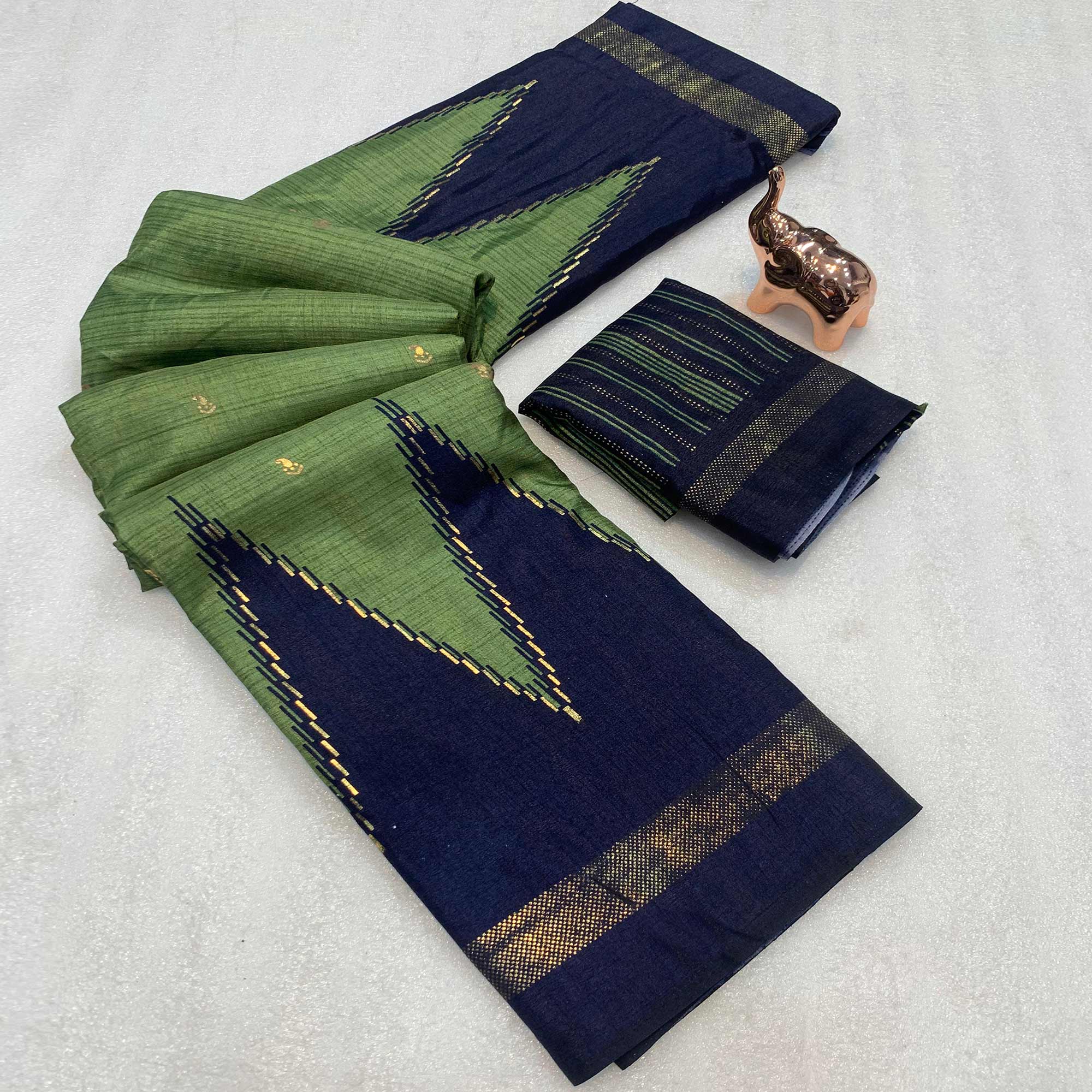 Subtle and Stylish Dusty Green Saree with Ikkat Prints in Luxe Dola Silk for Festive Wear