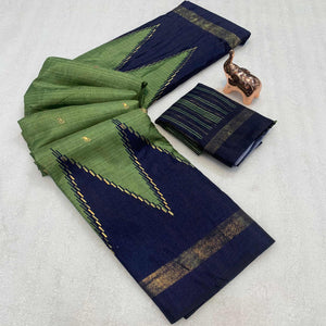 Subtle and Stylish Dusty Green Saree with Ikkat Prints in Luxe Dola Silk for Festive Wear