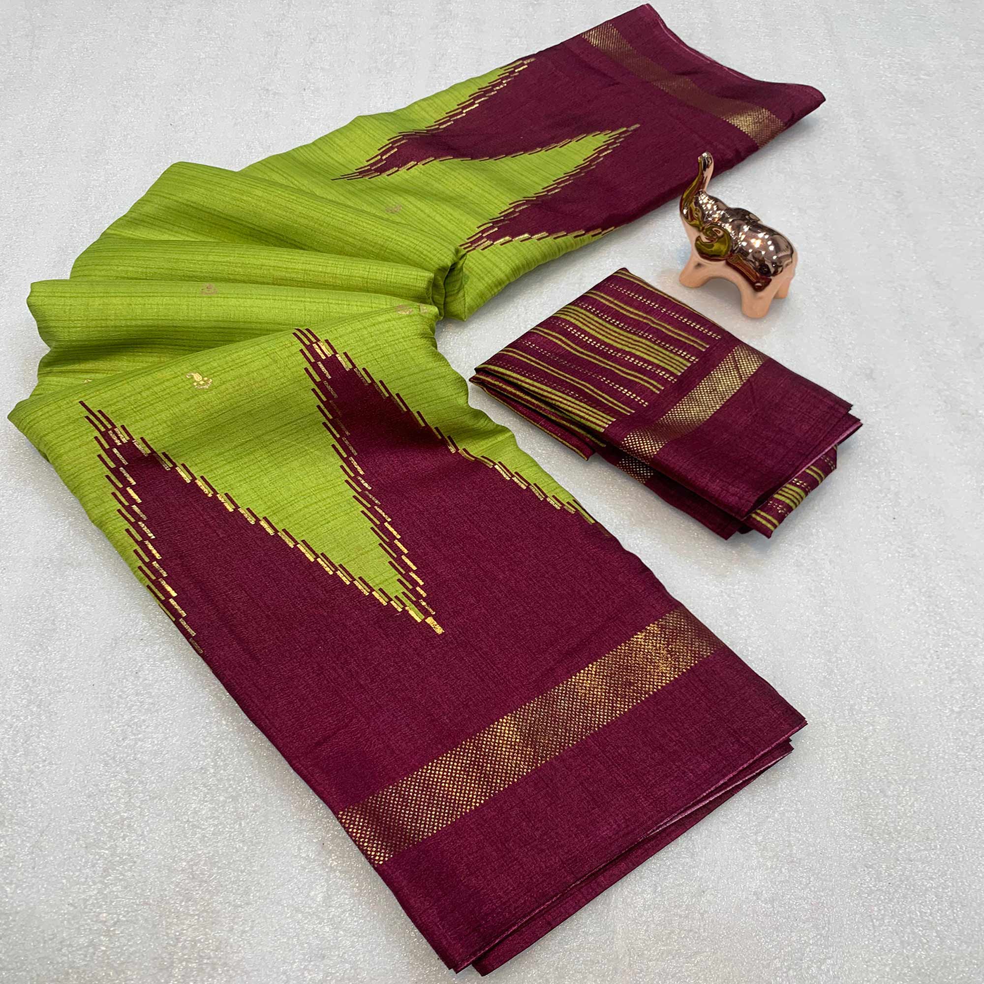 Subtle and Stylish Green Saree with Ikkat Prints in Luxe Dola Silk for Festive Wear