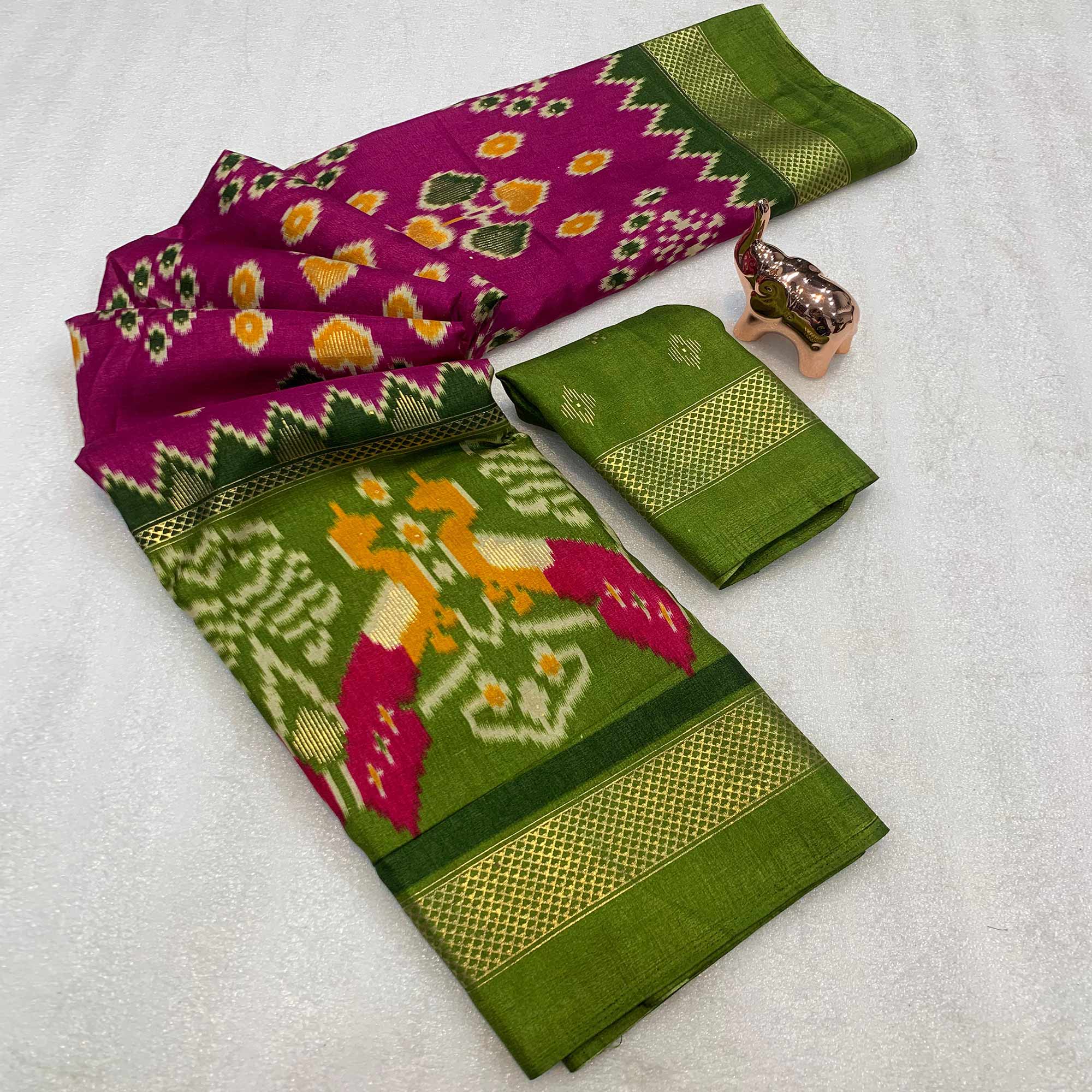 Subtle and Stylish Pink Saree with Ikkat Prints in Luxe Dola Silk for Festive Wear