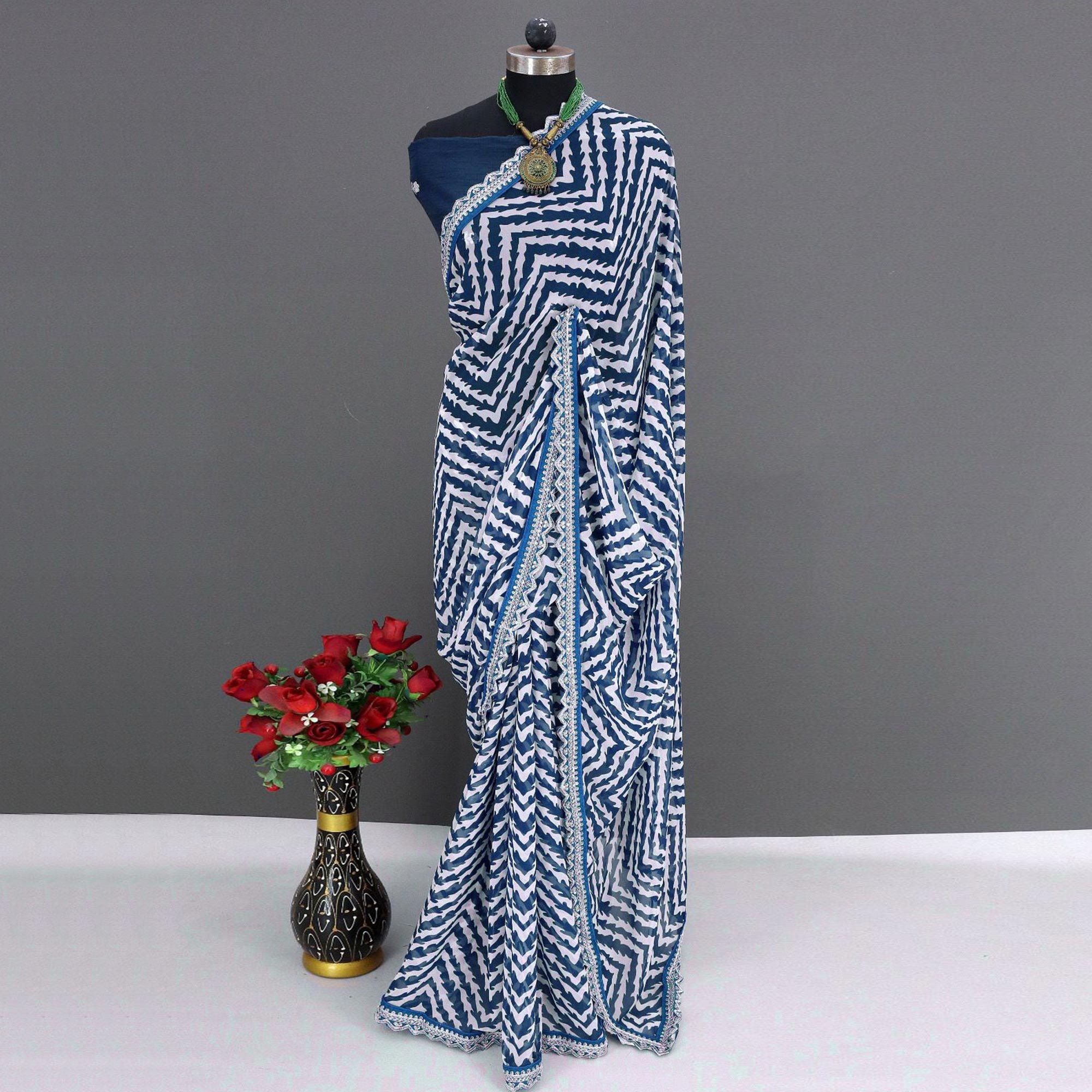 Blue Zig Zag Printed Georgette Saree With Sequins Embroidered Border