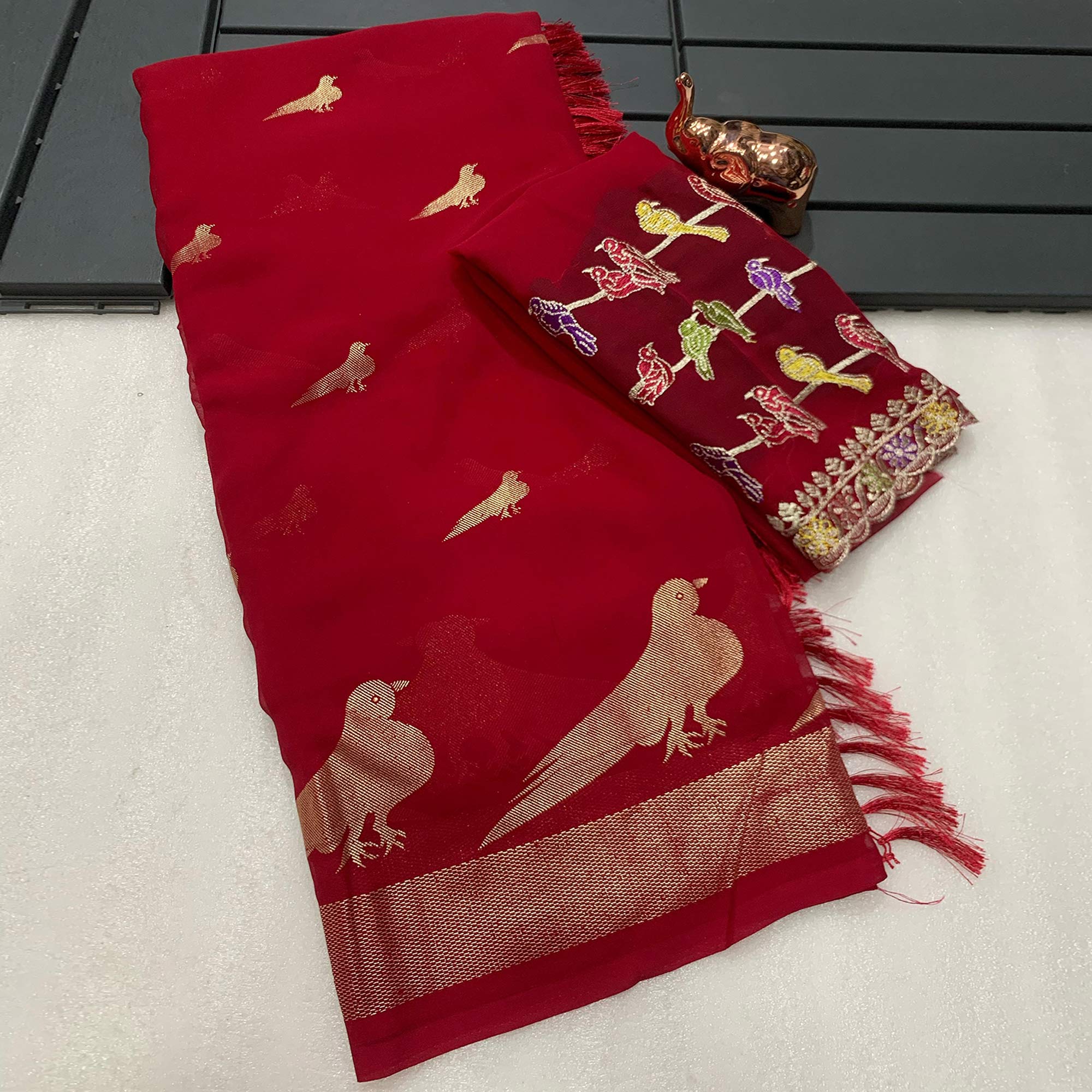 Pink Georgette Saree Adorned With Elegant Bird Embroidery