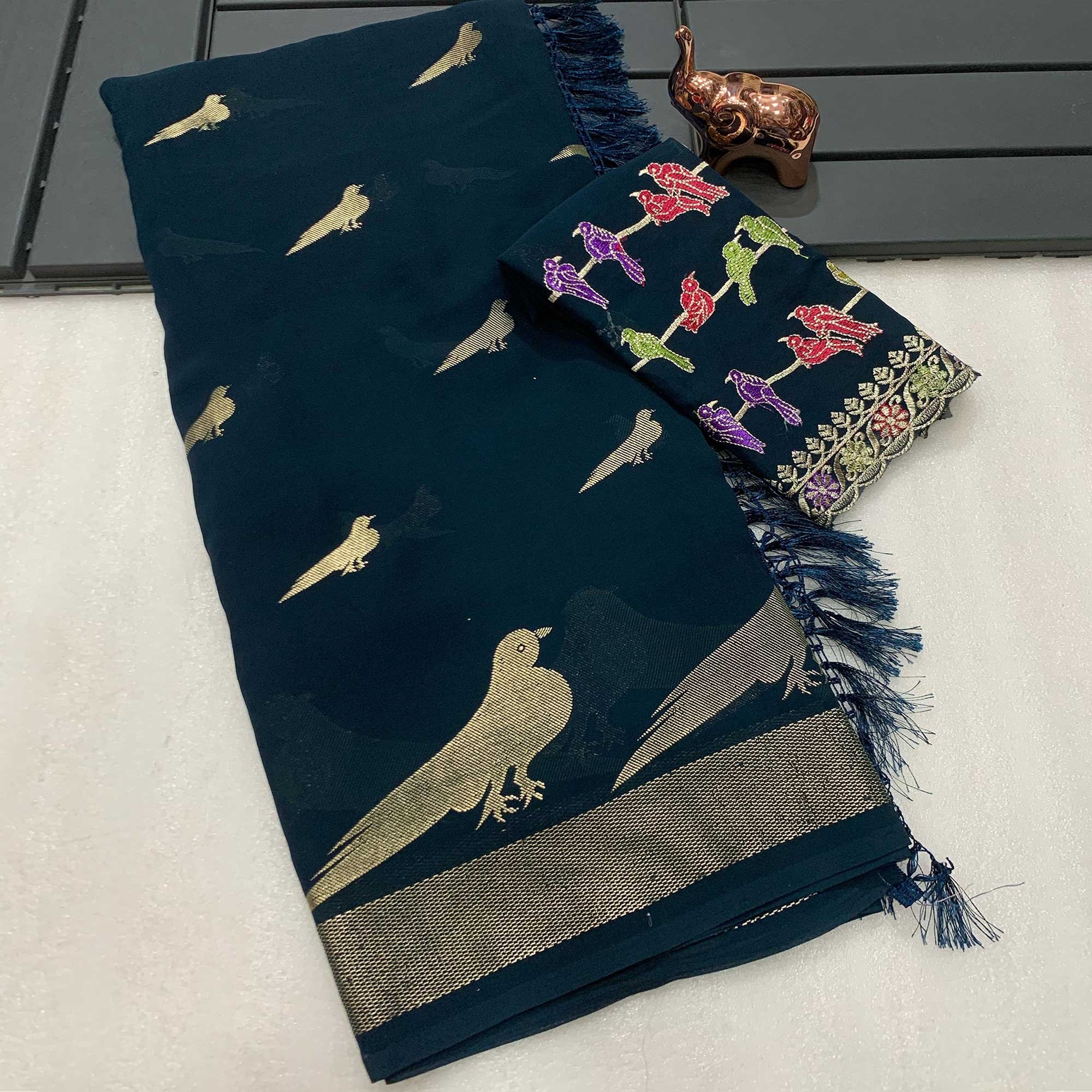 Teal Georgette Saree Adorned With Elegant Bird Embroidery