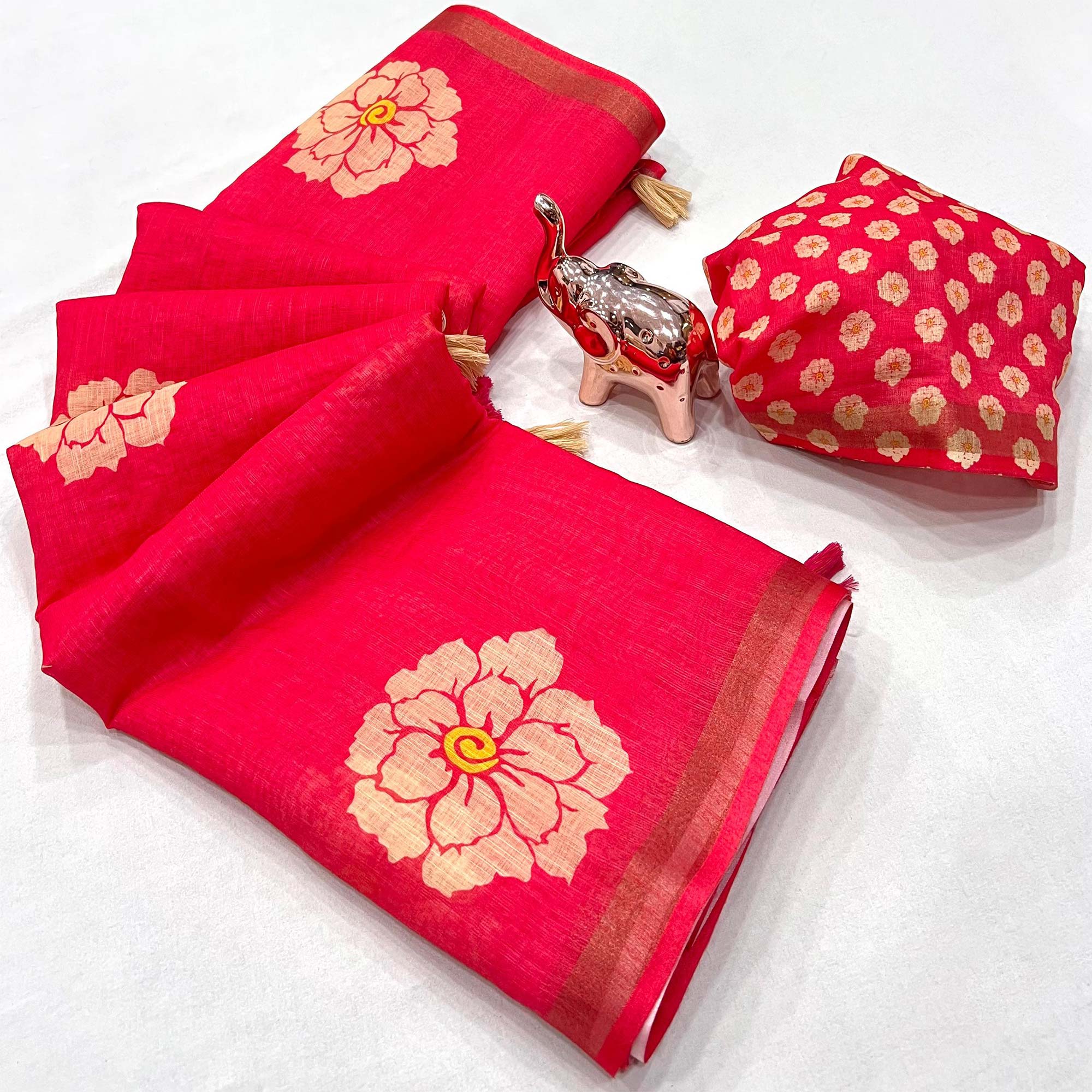 Graceful Pink Floral Printed Saree in Linen Silk with Delicate Tassel Accents