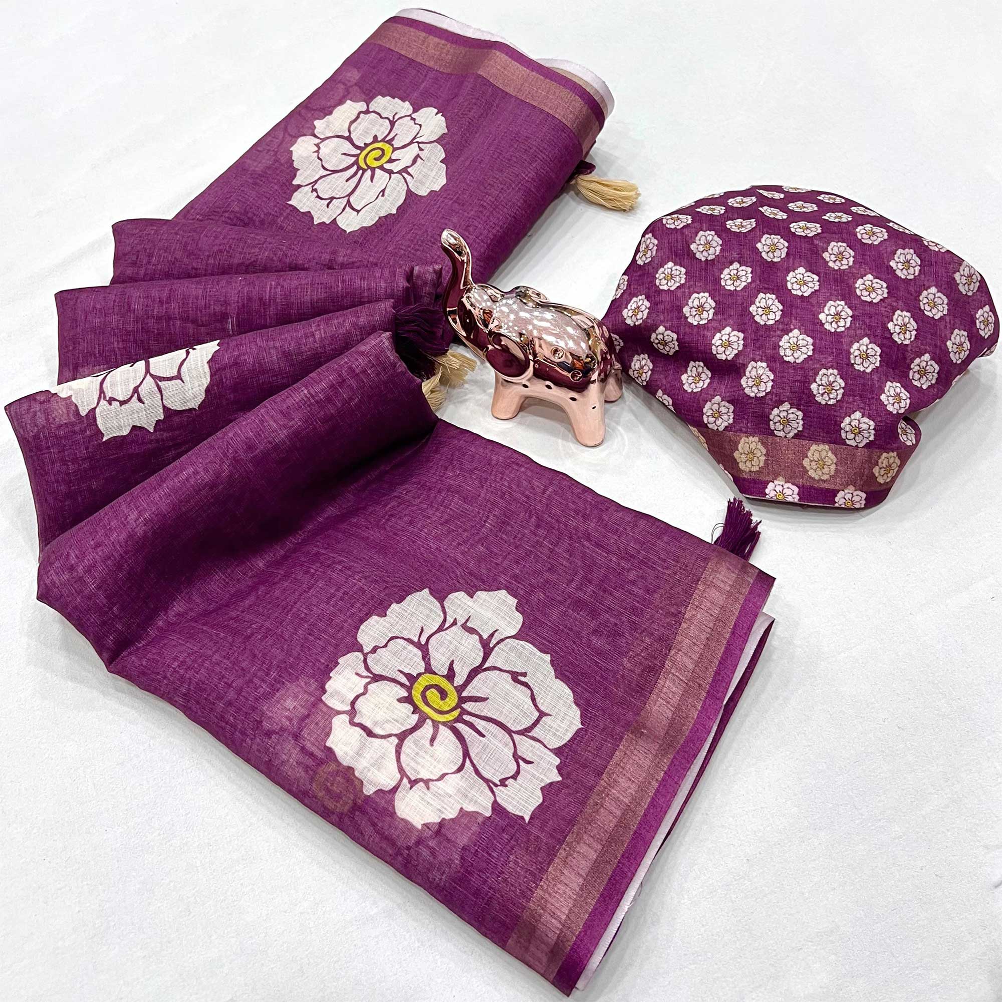 Graceful Purple Floral Printed Saree in Linen Silk with Delicate Tassel Accents