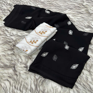 Black Embroidered Georgette Saree With Tassels