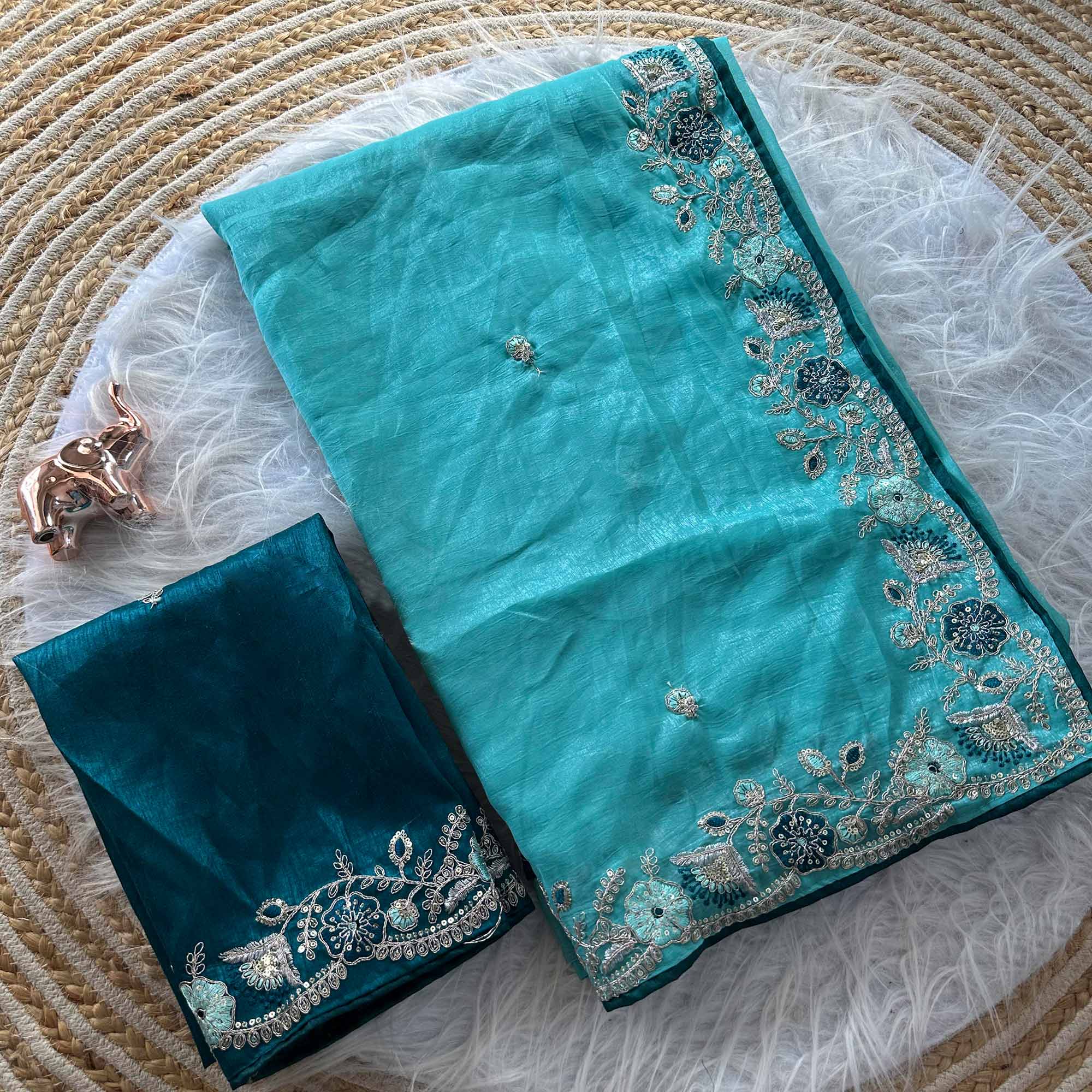 Blue Pure Silk Saree Showcasing Floral Sequins Embroidery With A Decorative Tassel Pallu
