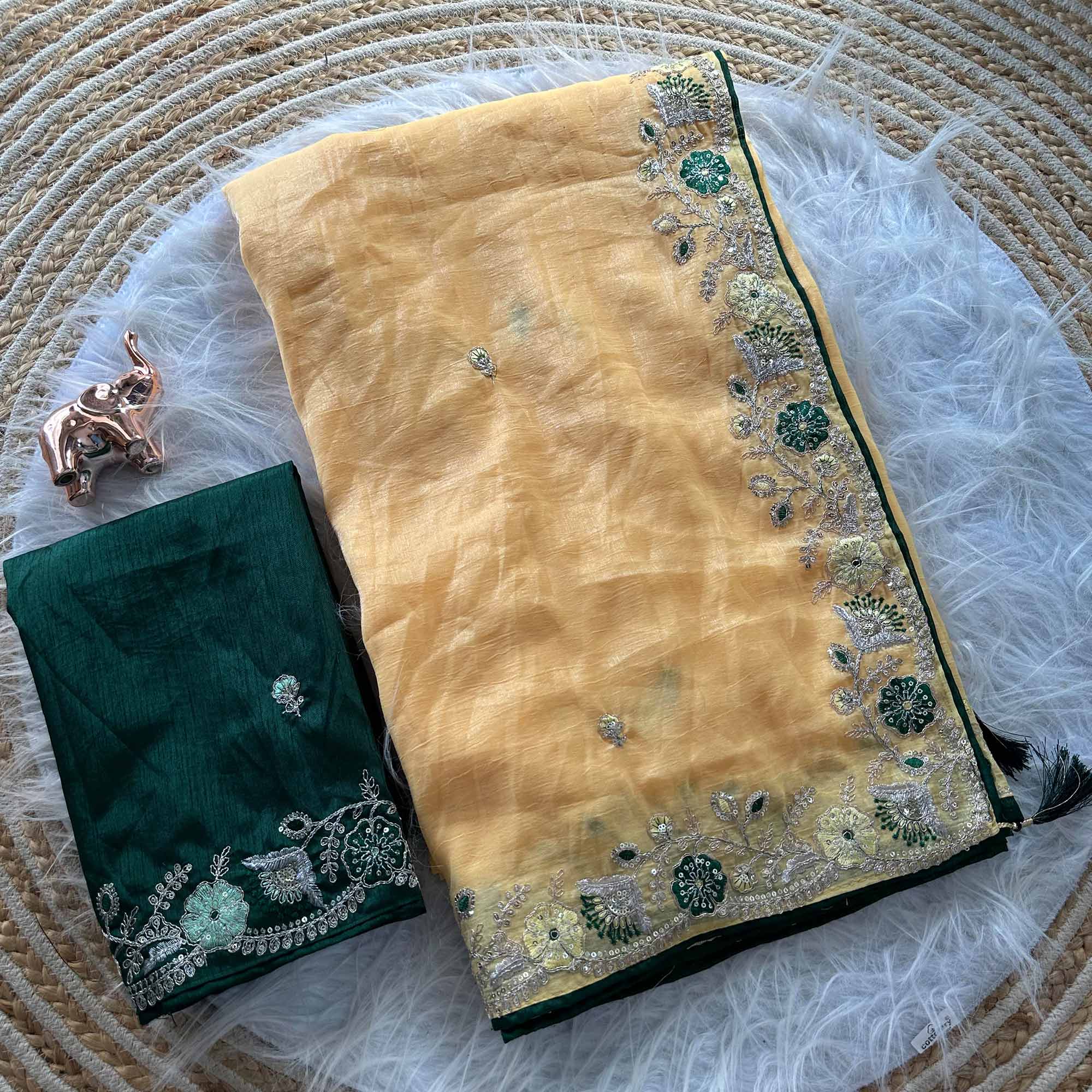 Yellow Pure Silk Saree Showcasing Floral Sequins Embroidery With A Decorative Tassel Pallu
