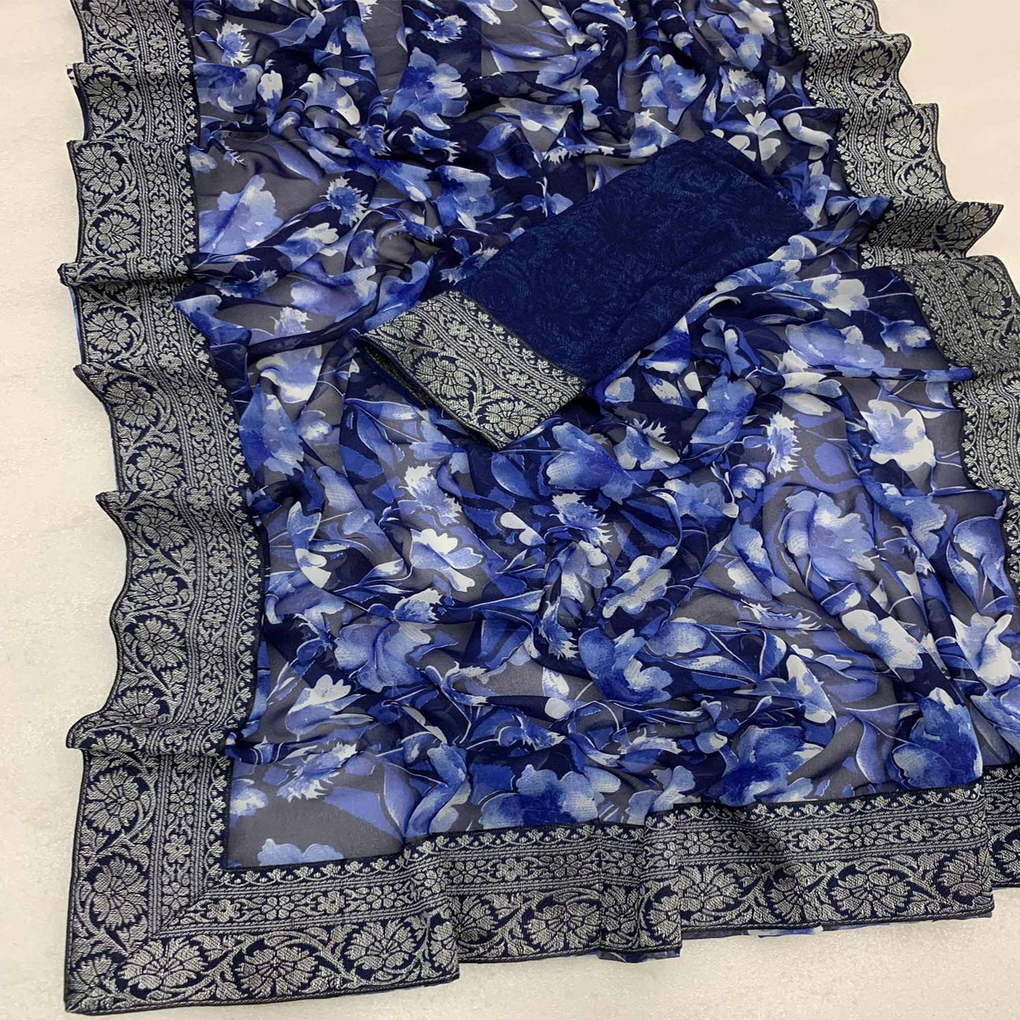 Blue Floral Printed Georgette Saree With Woven Border