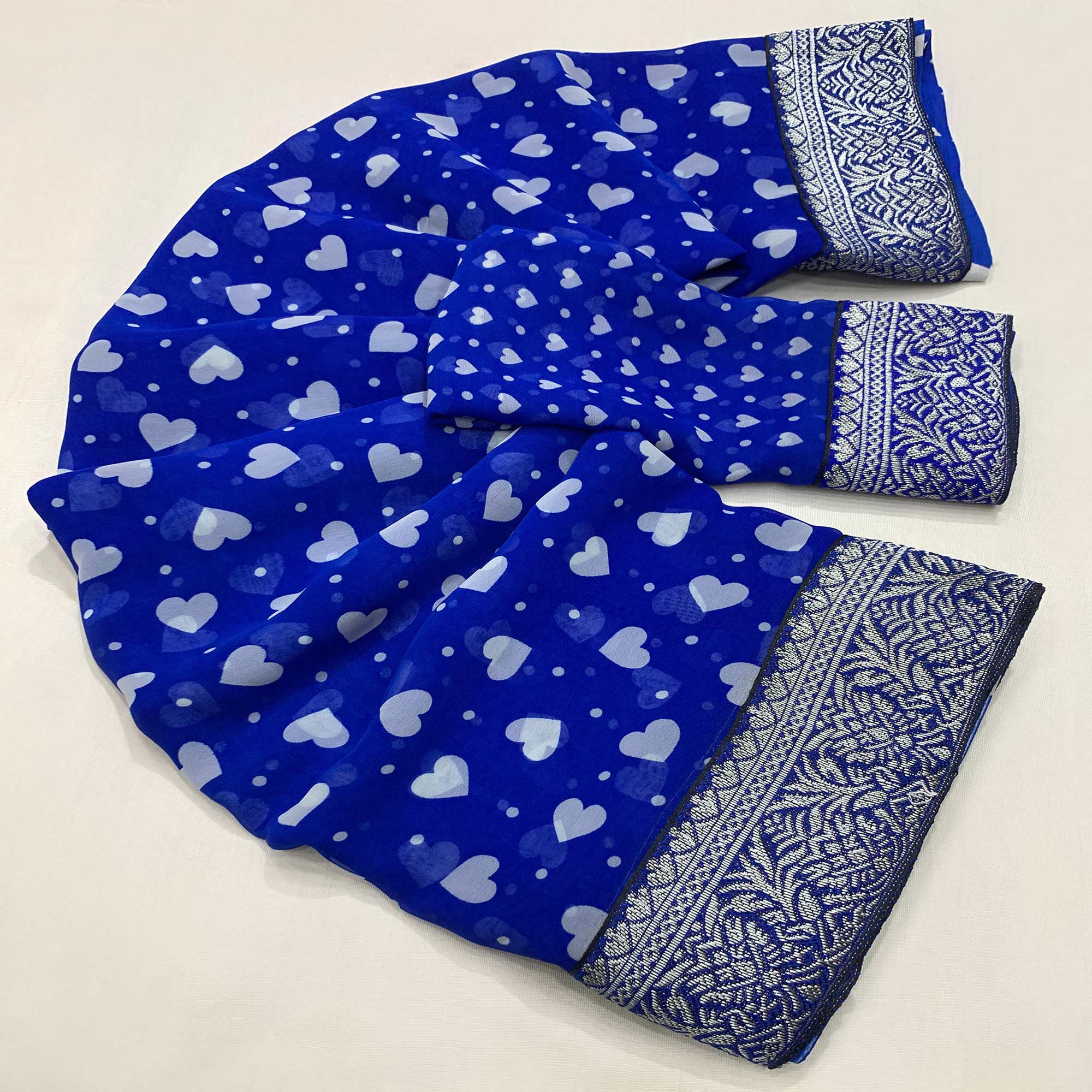 Blue Heart Printed Georgette Saree With Woven Border