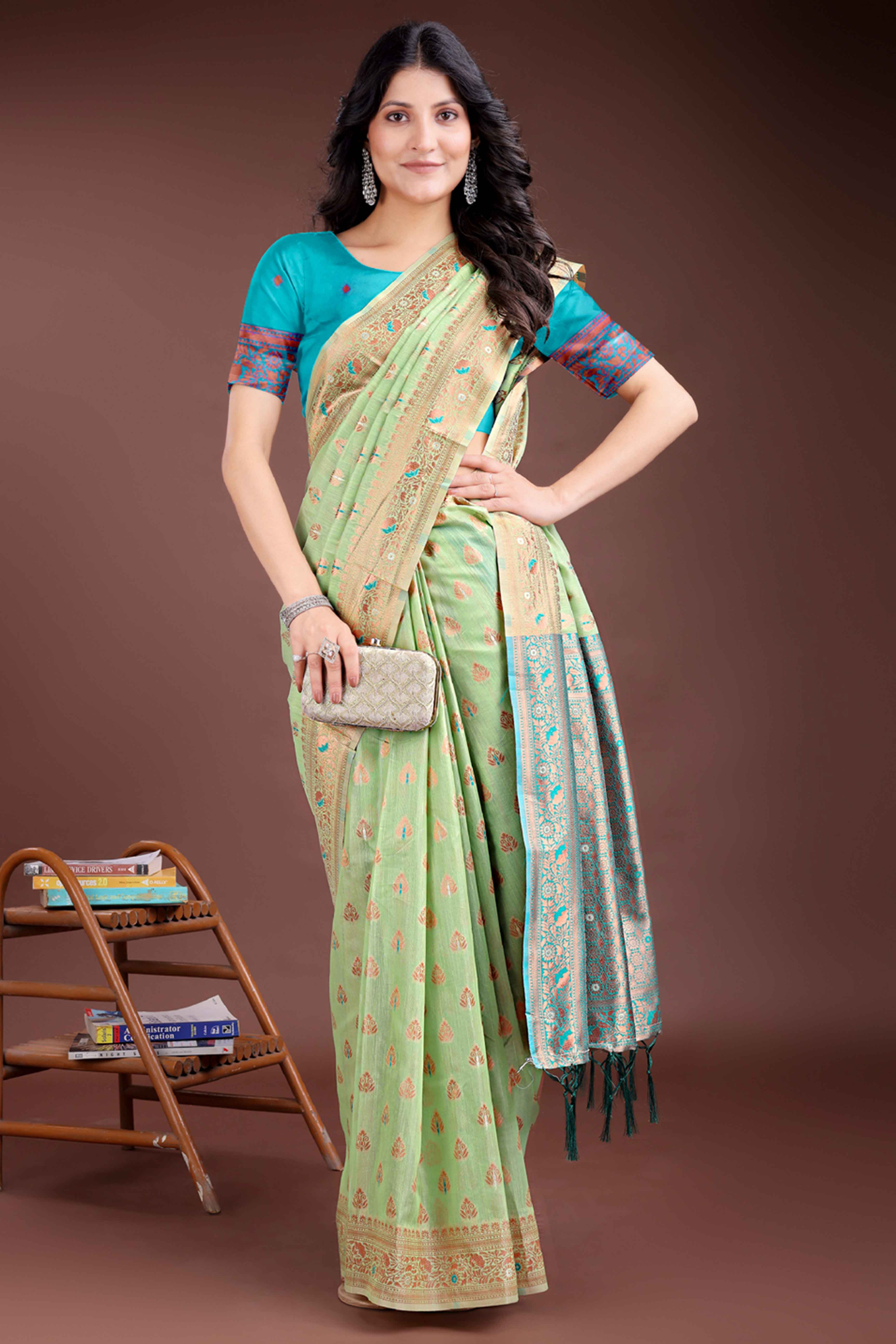 Harmonious Light Green Floral Zari Weaving Cotton Blend Saree with Graceful Tassels
