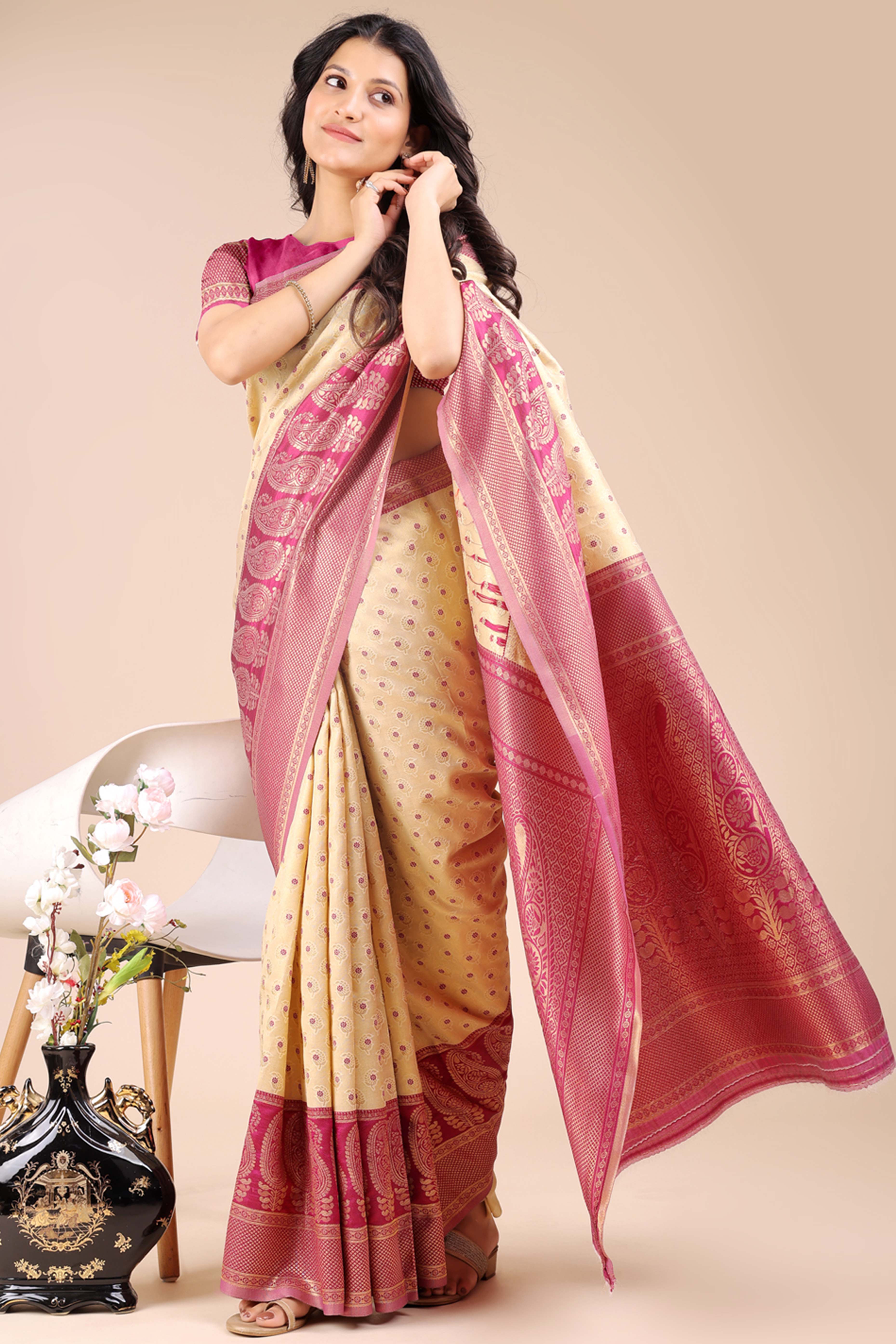Cream Banarasi Silk Saree Featuring Lustrous Magenta Floral Zari Weaving and a Rich Contrast Border